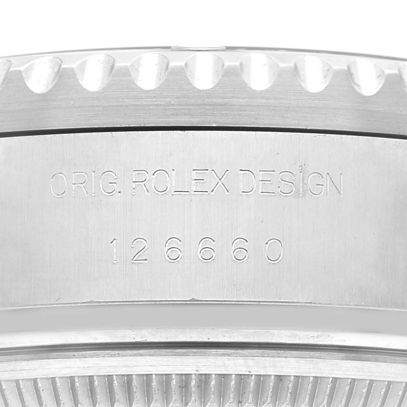 This image shows a close-up angle of the side casing of a Rolex Sea-Dweller 126660 Men
s Stainless Steel Blue Dial 126660 Men
s Stainless Steel Blue Dial model, featuring the engraved design and model number.