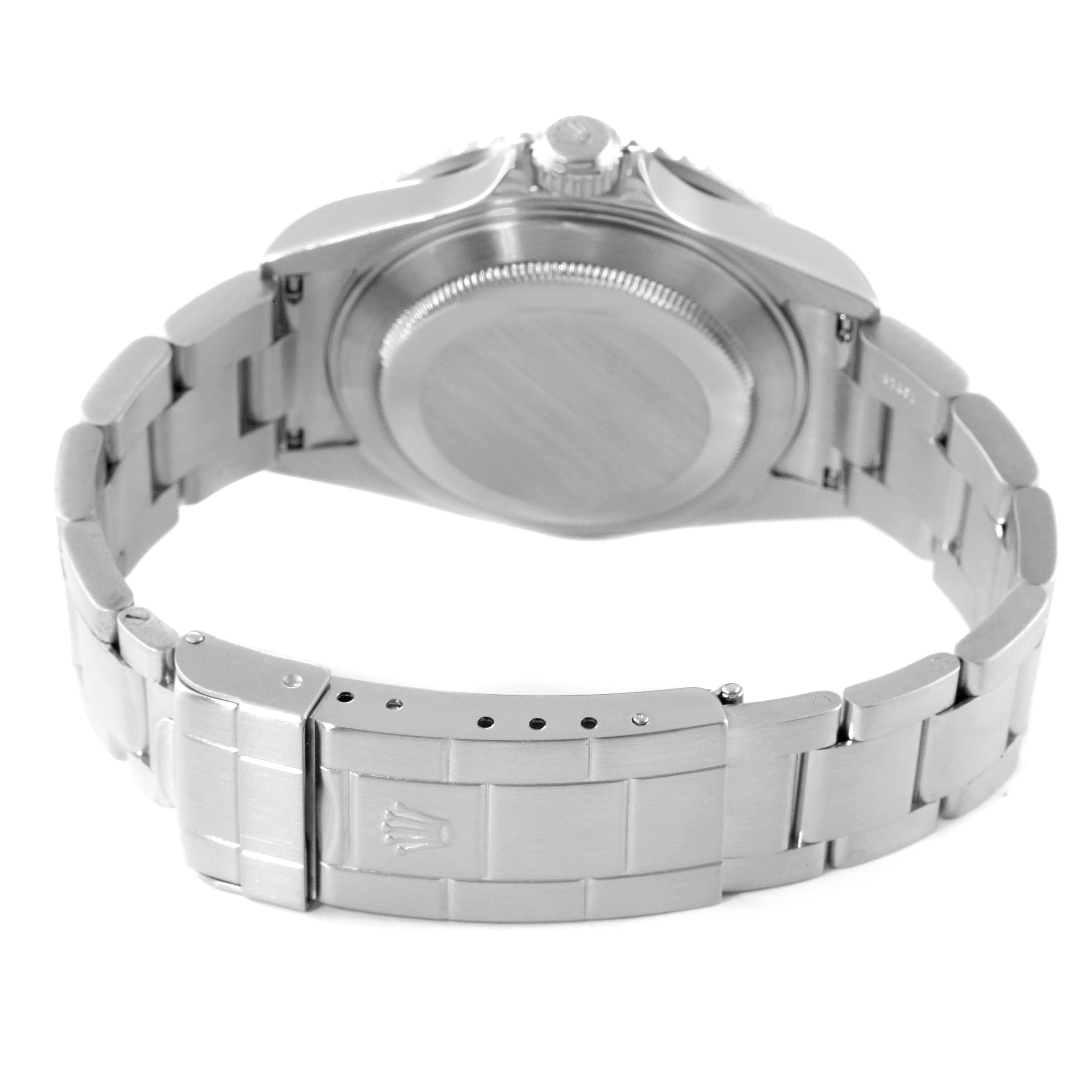 This image shows the back case and bracelet clasp of a Rolex Submariner 16610LV Men's Stainless Steel Black Dial 16610LV Men's Stainless Steel Black Dial watch.