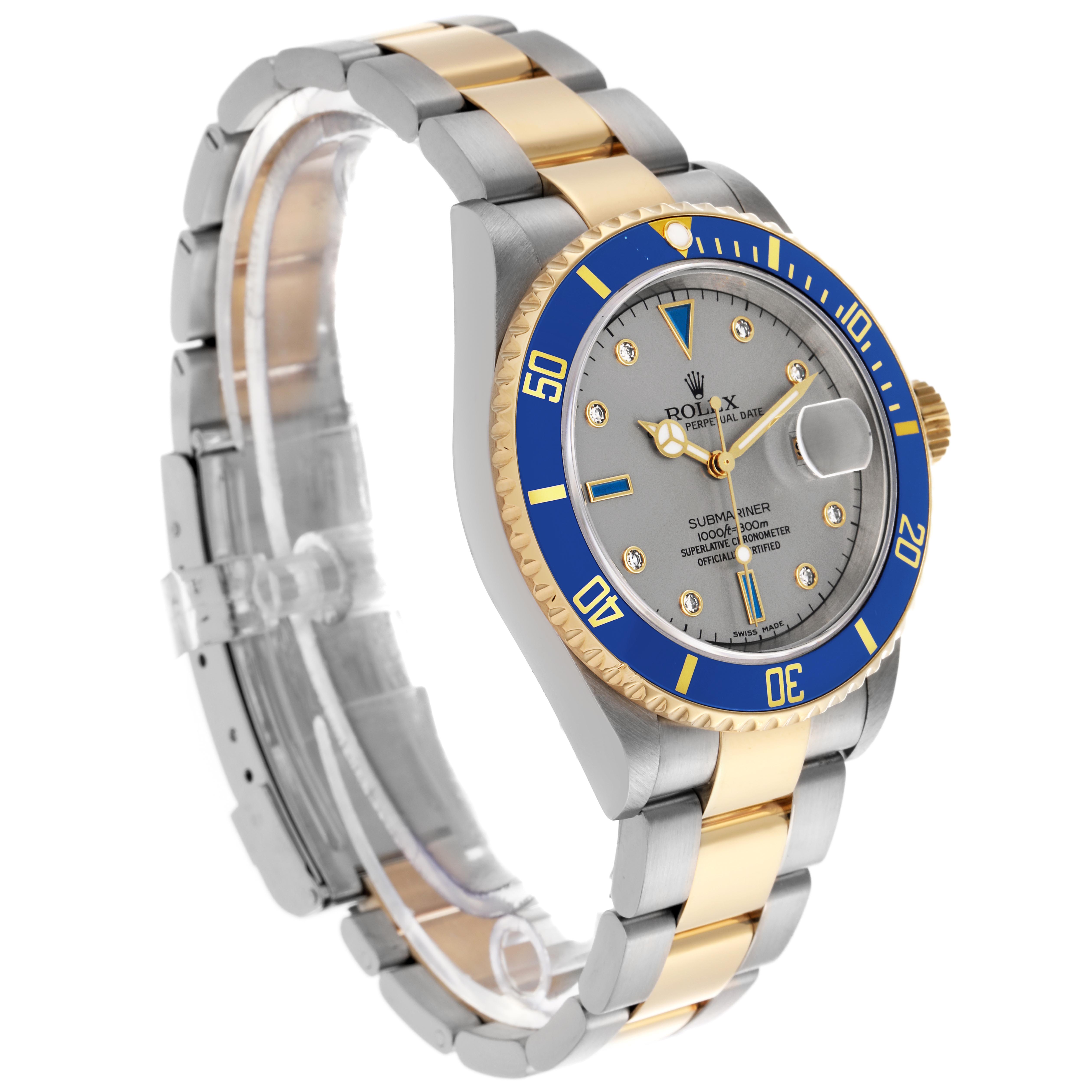 The Rolex Submariner 16613 Men's Steel and Gold (two tone) Silver Dial 16613 Men's Steel and Gold (two tone) Silver Dial watch is shown at a three-quarter angle, highlighting the face, bezel, crown, and bracelet.