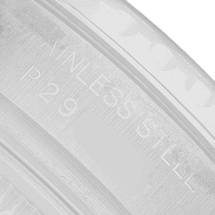 The image shows a close-up of the edge and engraving on the bezel of a Rolex Yacht-Master 169622 Women's Stainless Steel Silver Dial watch.