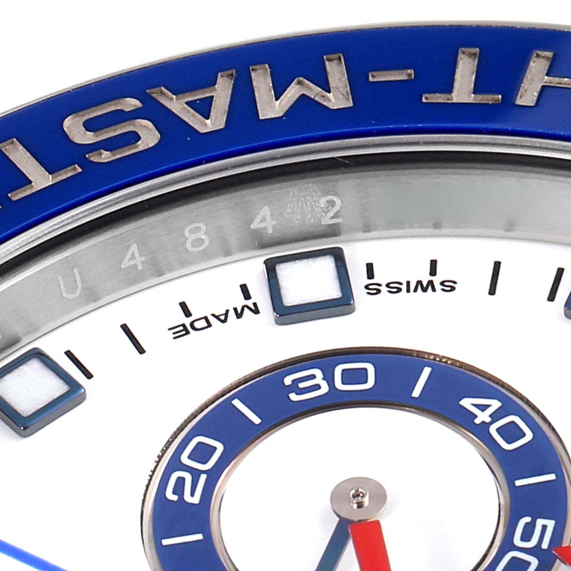 The image shows a close-up of the Yacht-Master watch face by Rolex, showcasing the bezel and part of the dial.