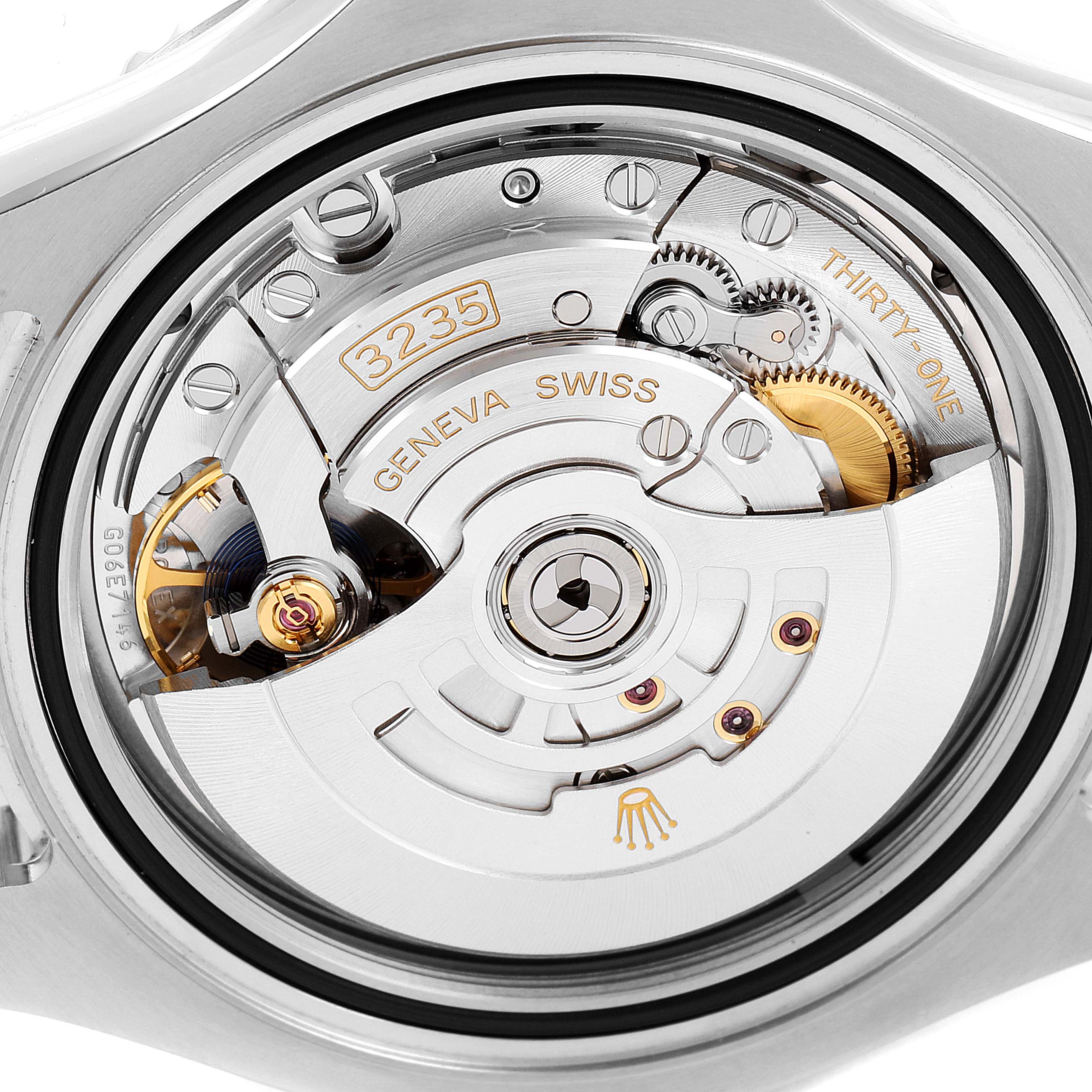 The image shows the inner mechanics of the Rolex Yacht-Master 126622 Men's Stainless Steel Grey Dial 126622 Men's Stainless Steel Grey Dial watch, specifically its movement and rotor, from a direct angle.