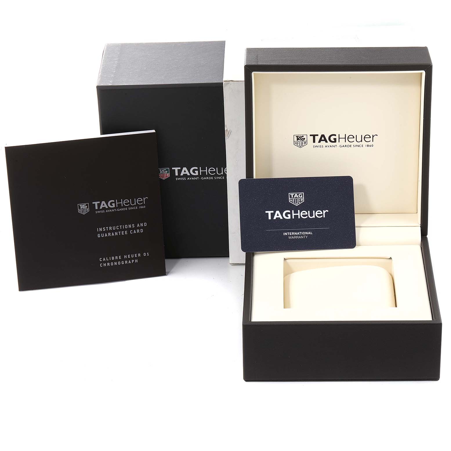 The image shows the packaging, instruction booklet, and warranty card for a Tag Heuer Carrera CAR5A8C.BF0707 Men's Titanium Blue Dial CAR5A8C.BF0707 Men's Titanium Blue Dial model watch.