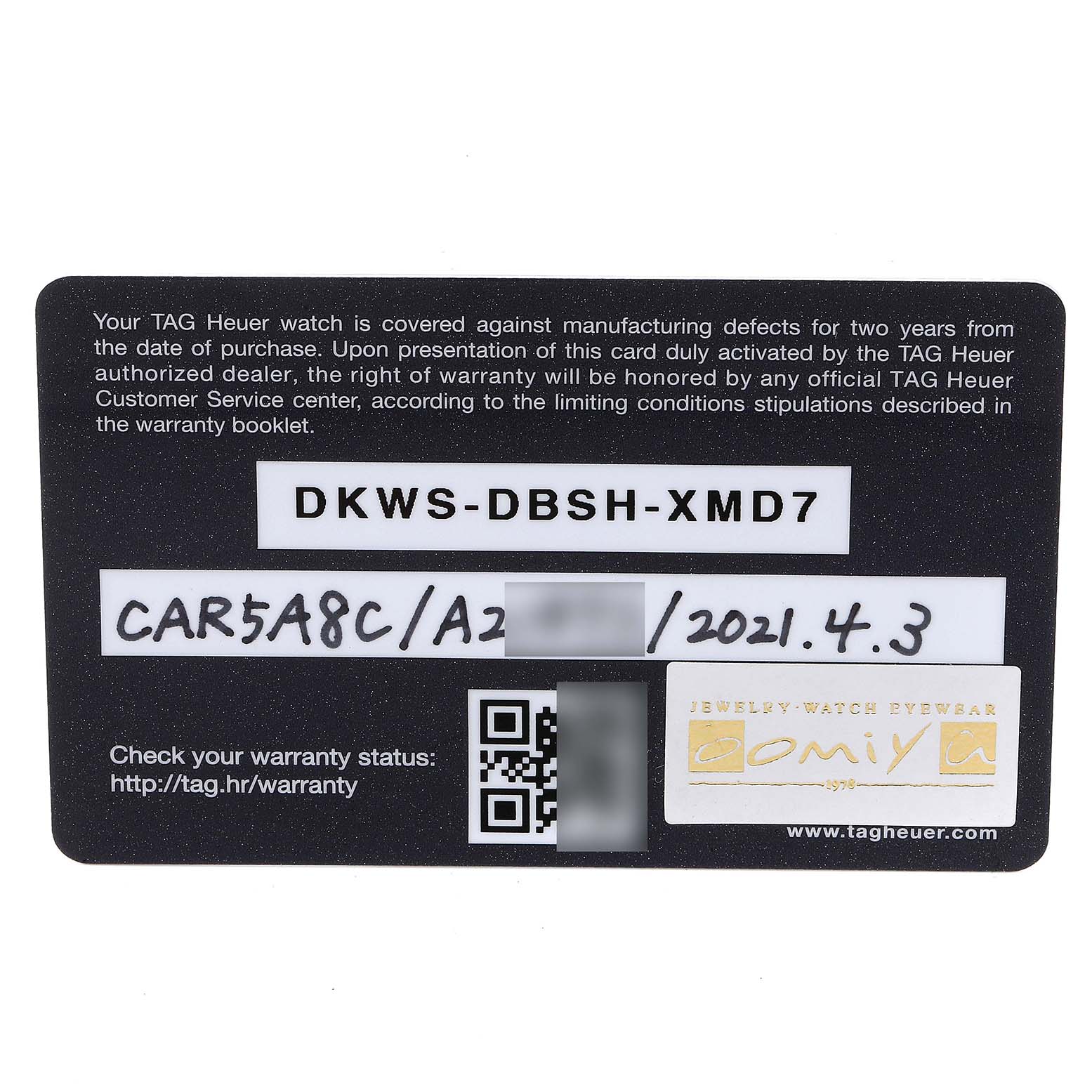 This is the warranty card for the Tag Heuer Carrera CAR5A8C.BF0707 Men's Titanium Blue Dial CAR5A8C.BF0707 Men's Titanium Blue Dial model watch, showing its serial number and purchase details.