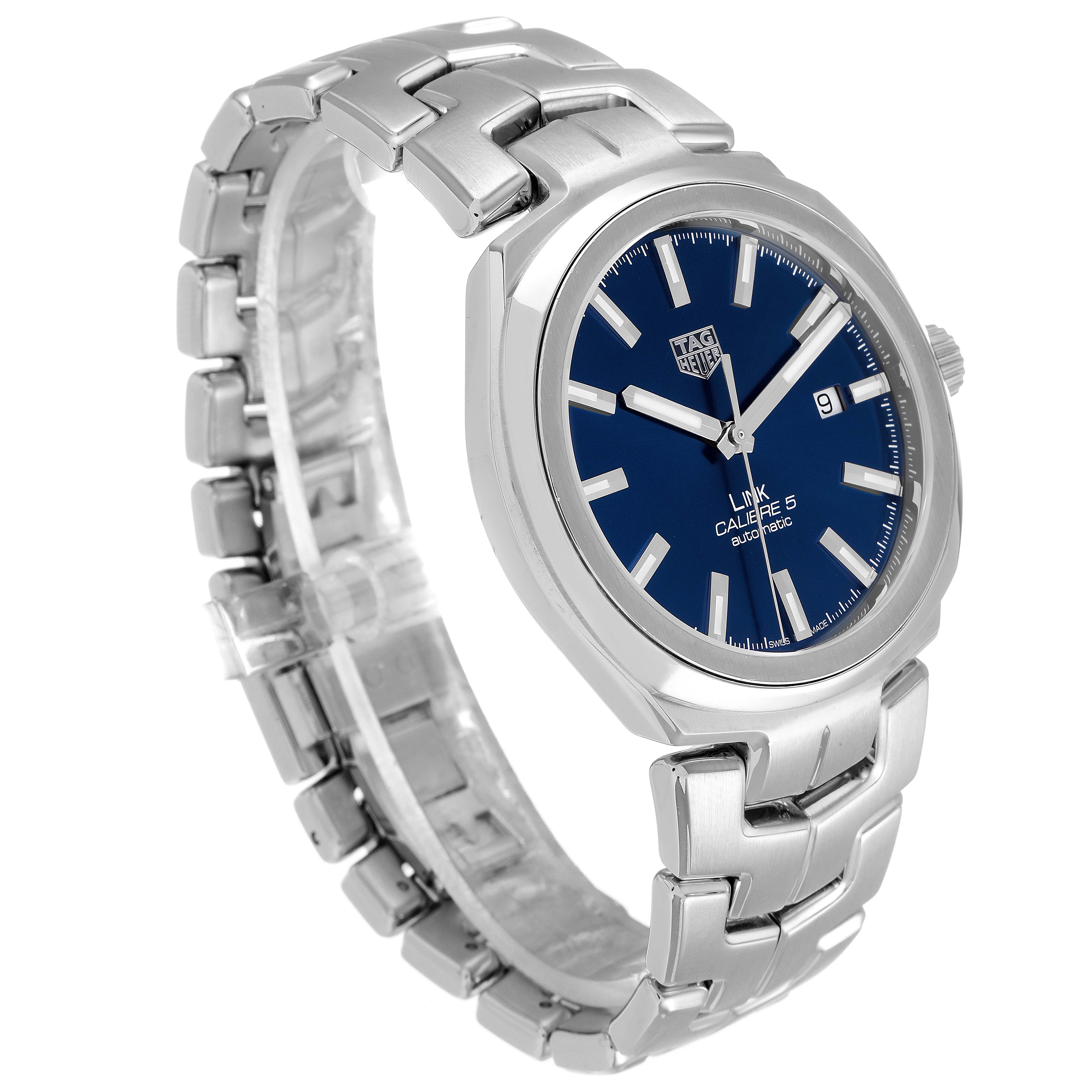 This image shows a side-angle view of a Tag Heuer Link WBC2112.BA0603 Men's Stainless Steel Blue Dial WBC2112.BA0603 Men's Stainless Steel Blue Dial model watch, highlighting the blue dial, bezel, and metal bracelet.