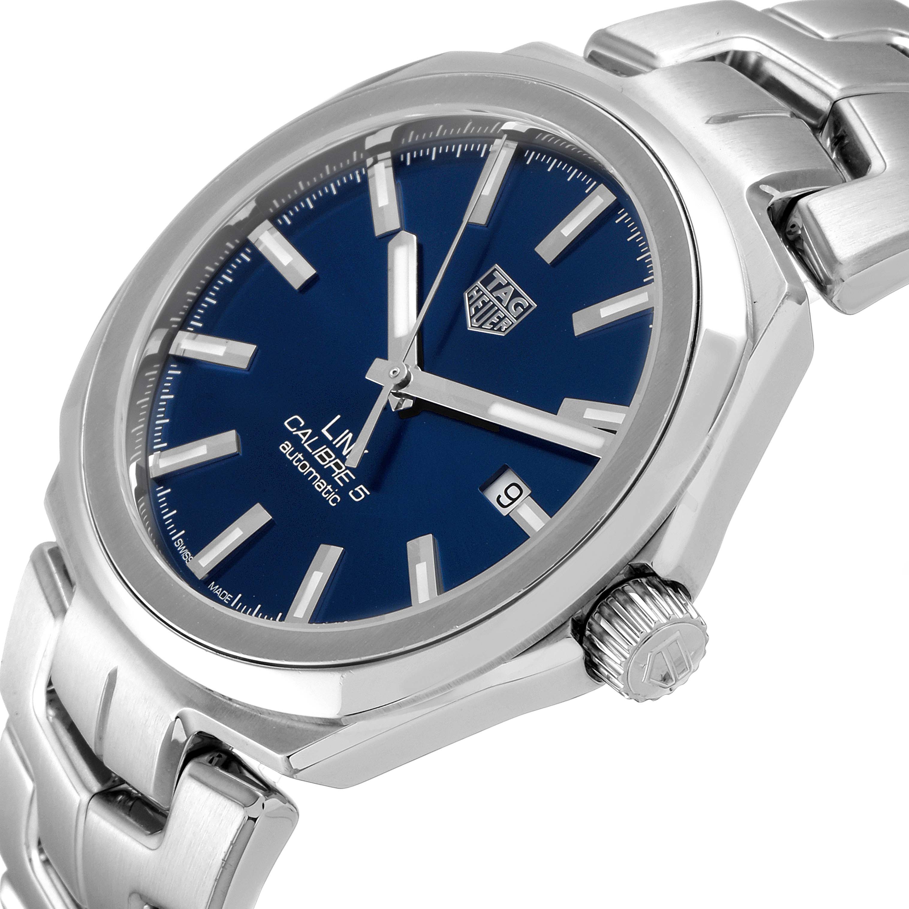 The image shows a Tag Heuer Link WBC2112.BA0603 Men's Stainless Steel Blue Dial WBC2112.BA0603 Men's Stainless Steel Blue Dial watch at an angled view, displaying its blue dial, crown, and part of its stainless steel bracelet.