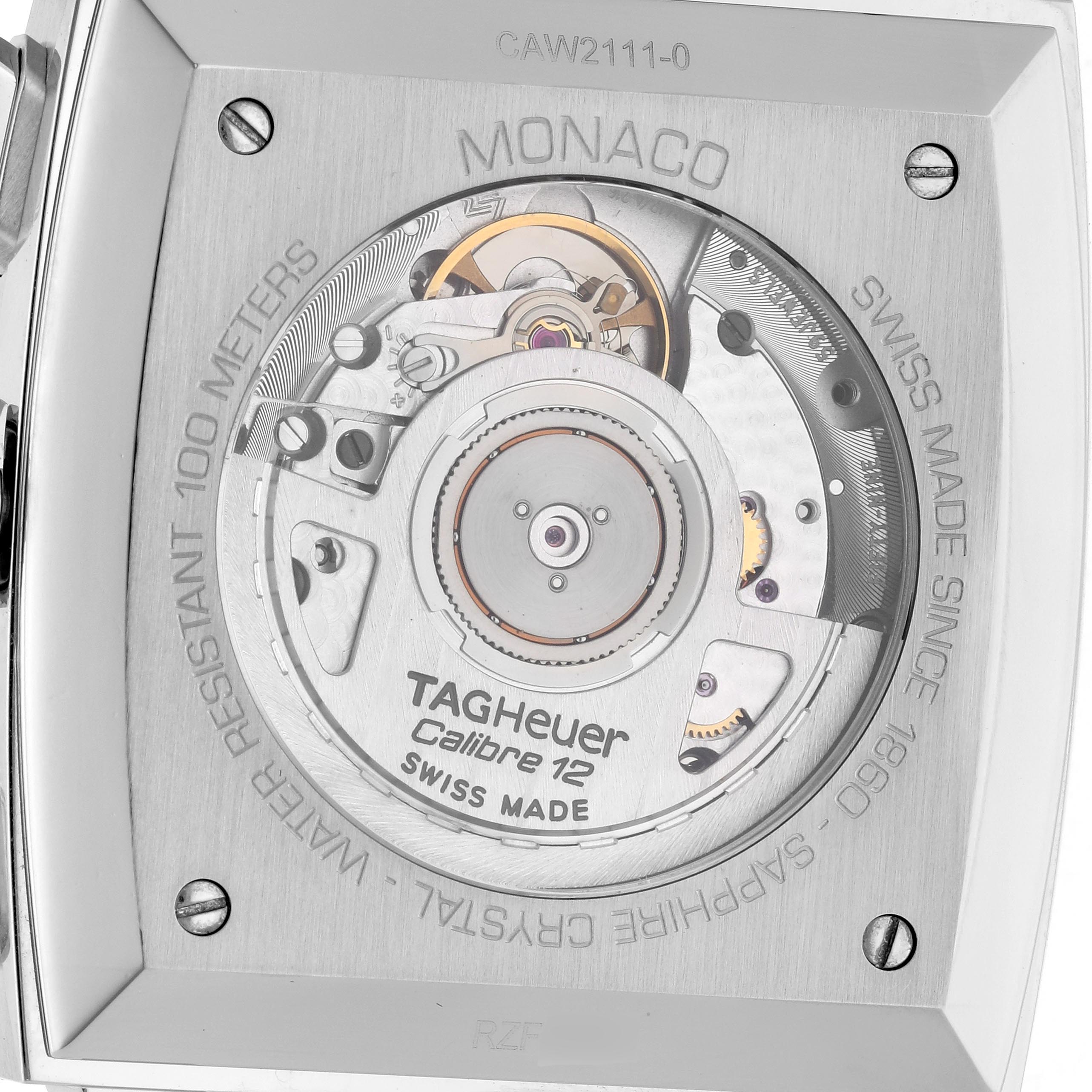 The image shows the case back of a Tag Heuer Monaco CAW2111-0 Men's Stainless Steel Blue Dial CAW2111-0 Men's Stainless Steel Blue Dial watch, displaying its movement and inscriptions.