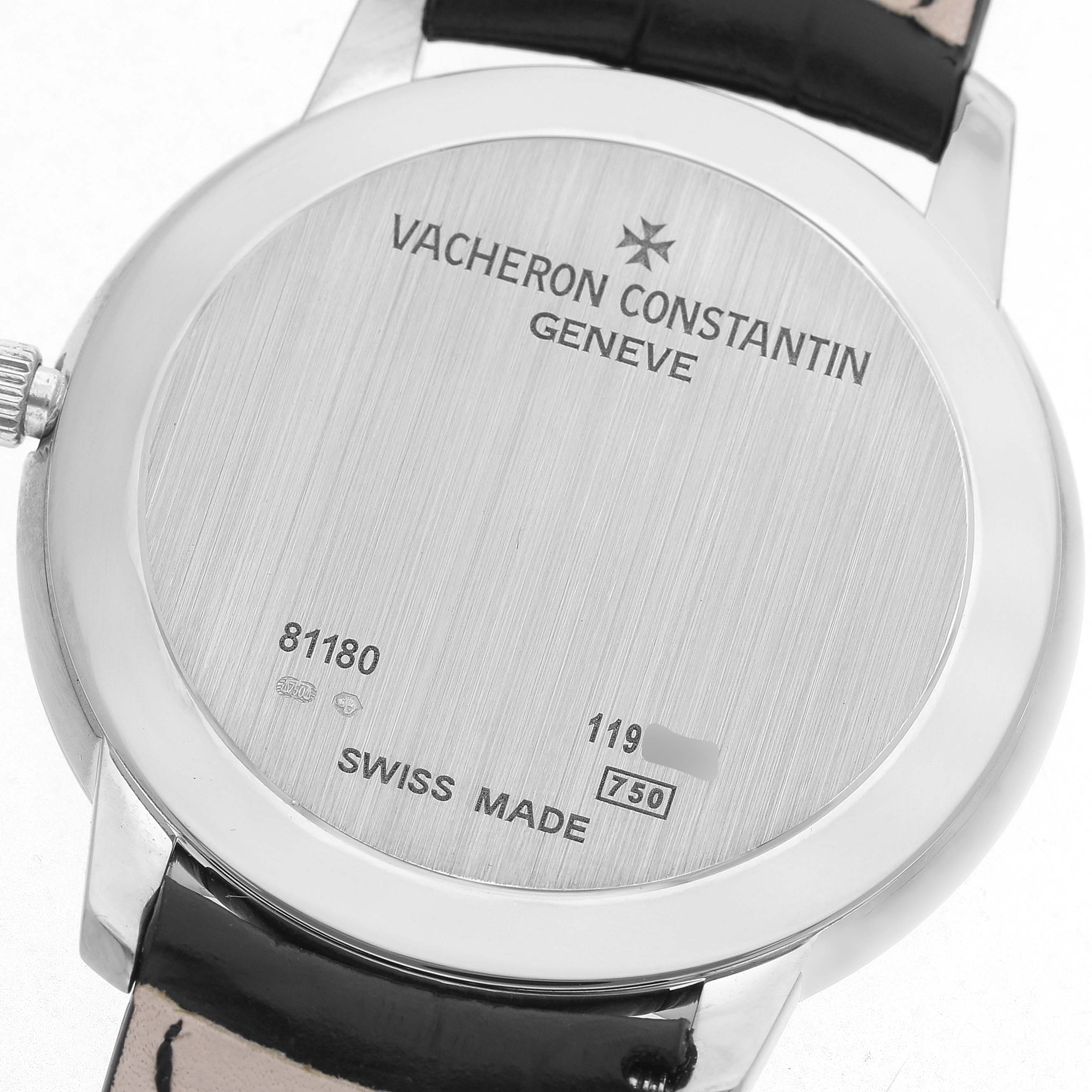 The image shows the back of the Vacheron Constantin Patrimony 81180/000G Men's White Gold Silver Dial watch, displaying the case back with engravings and model details.