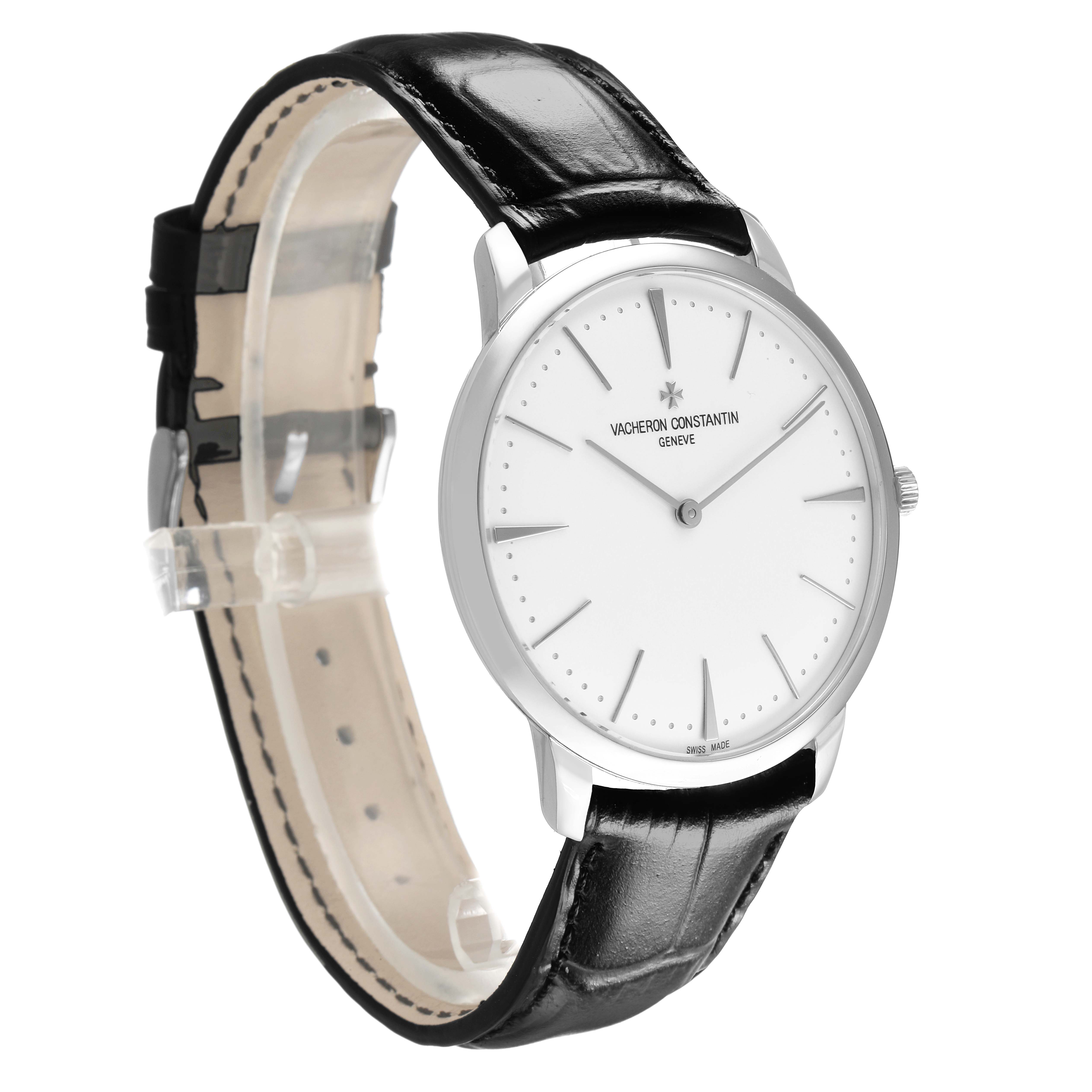 The Vacheron Constantin Patrimony 81180/000G Men's White Gold Silver Dial watch is shown at an angled side view, displaying the face, black leather strap, and crown.