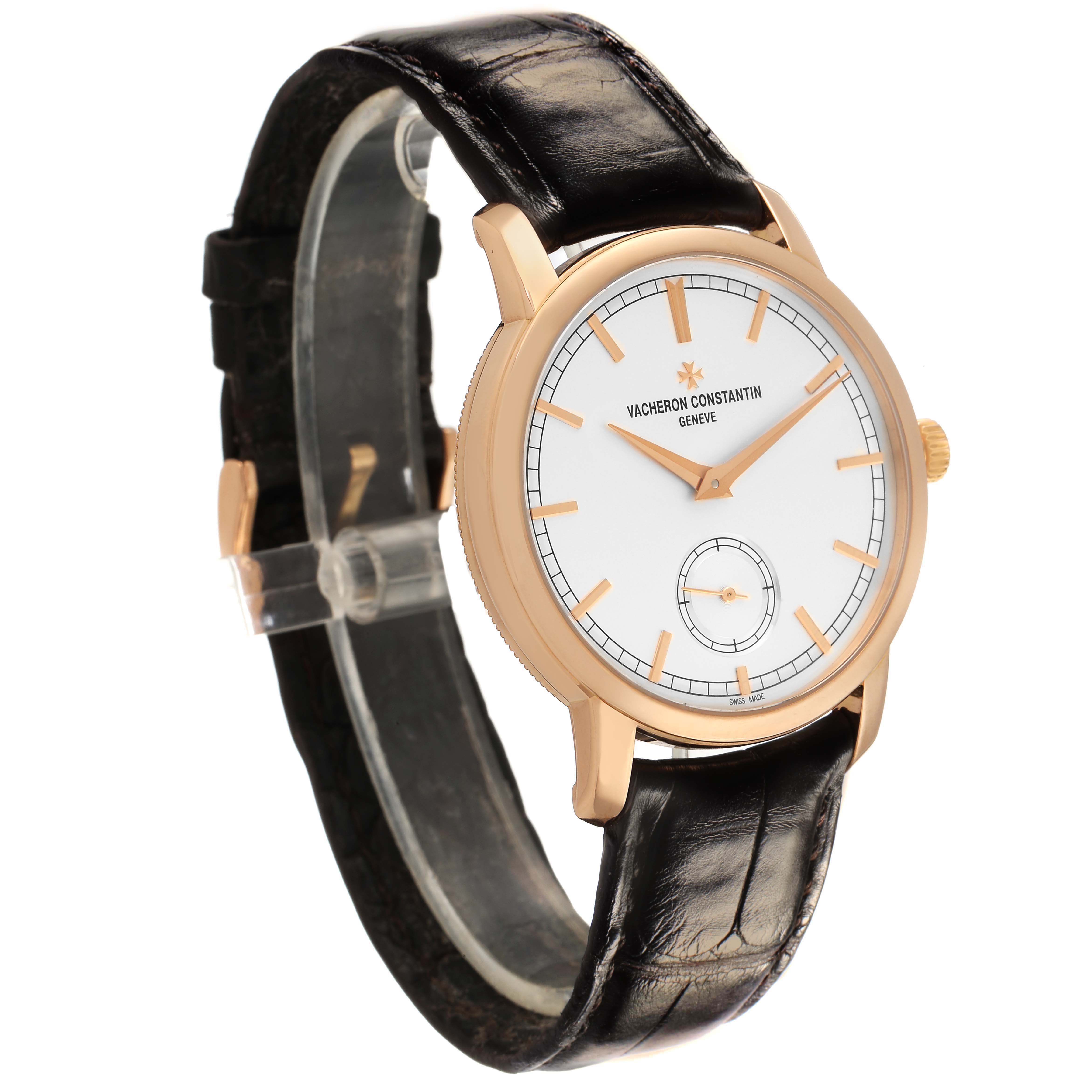 The Vacheron Constantin Traditionnelle 82172/000R-9382 Men's Rose Gold Silver Dial watch is shown at a three-quarter angle, highlighting its face, gold case, and leather strap.