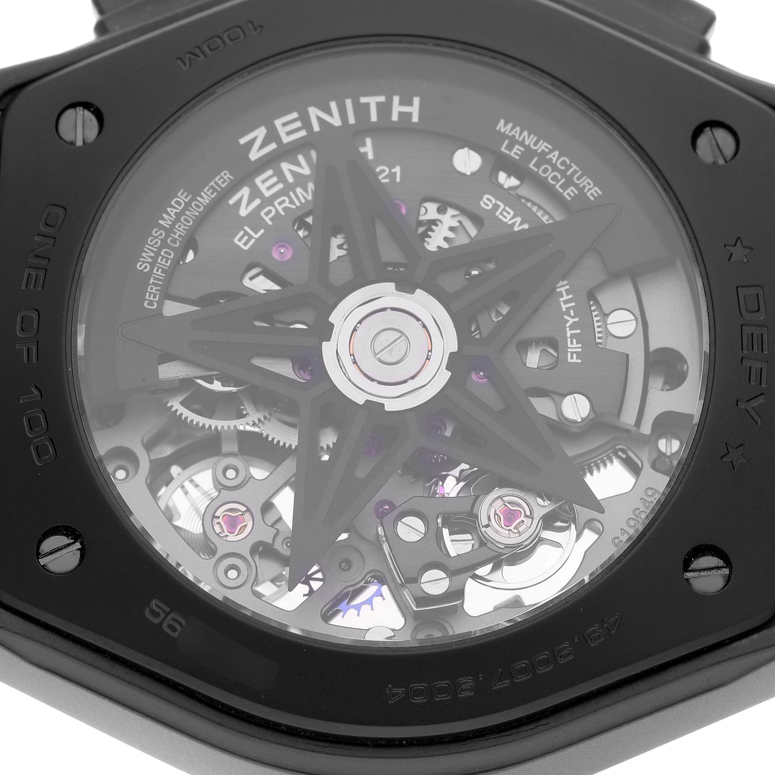 The image shows the back of a Zenith Defy 49.9007.9004 Men's Ceramic Black Dial model, highlighting its intricate movement and skeletonized design elements.