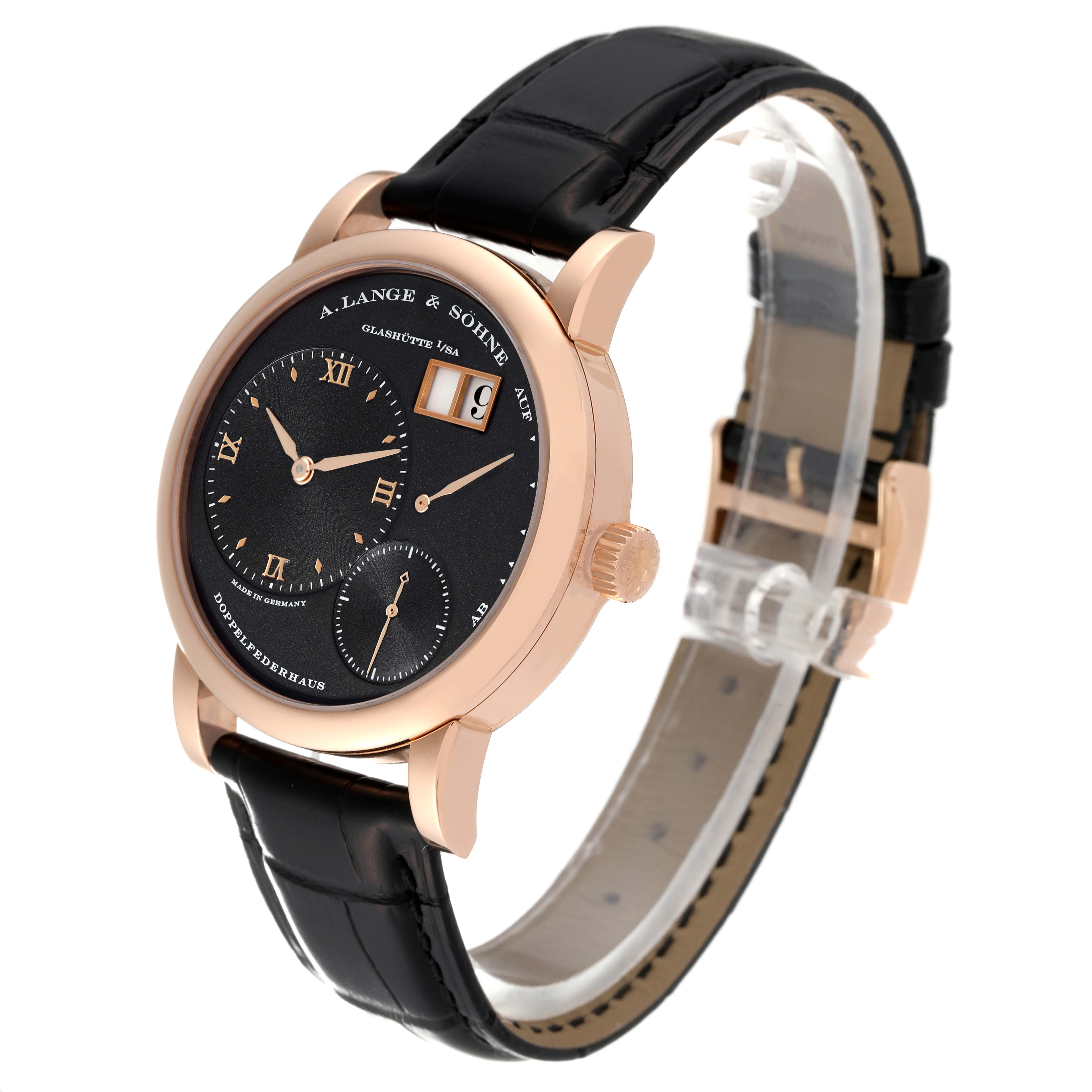 The image shows the A. Lange & Sohne Lange 1 101.031 Men's Rose Gold Black Dial watch from an angled front view, displaying its face, crown, and black leather strap.