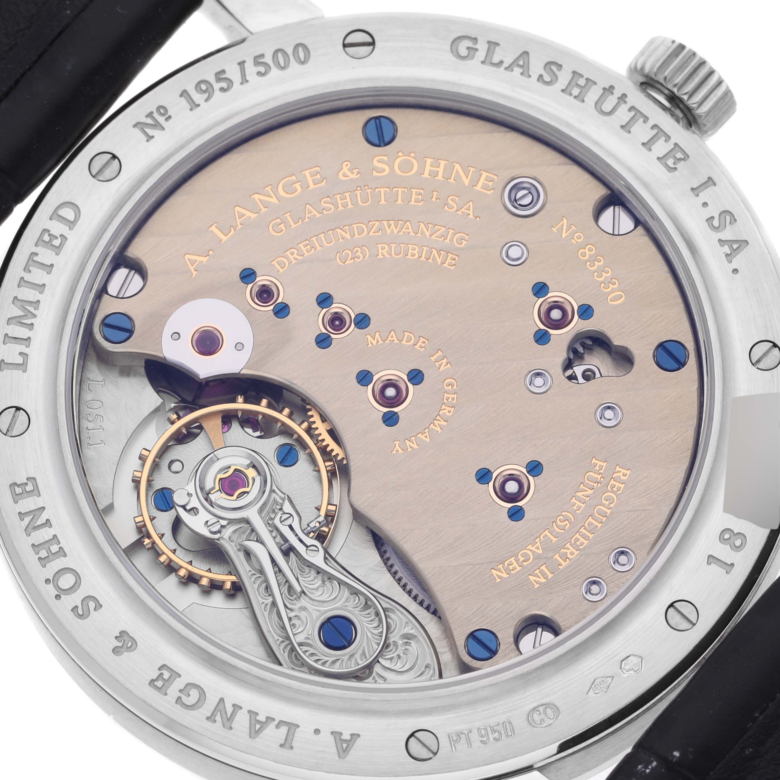 The image shows the back view of an A. Lange & Sohne 1815 233.025 Men's Platinum Silver Dial model, highlighting the intricate movement and limited edition number.