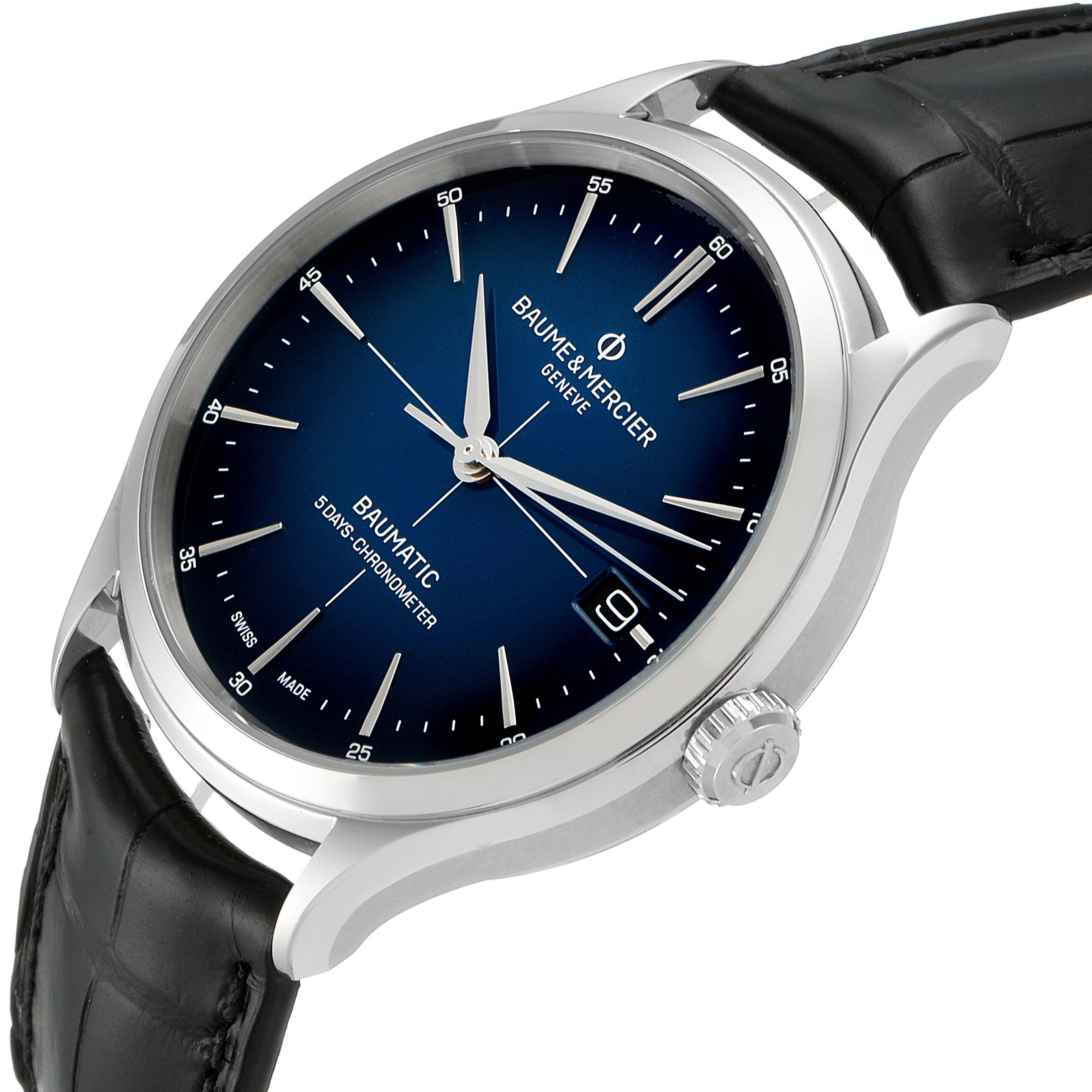 The image shows a Baume & Mercier Clifton M0A10467 Men's Stainless Steel Blue Dial M0A10467 Men's Stainless Steel Blue Dial watch at an angle displaying the face, crown, and black leather strap.