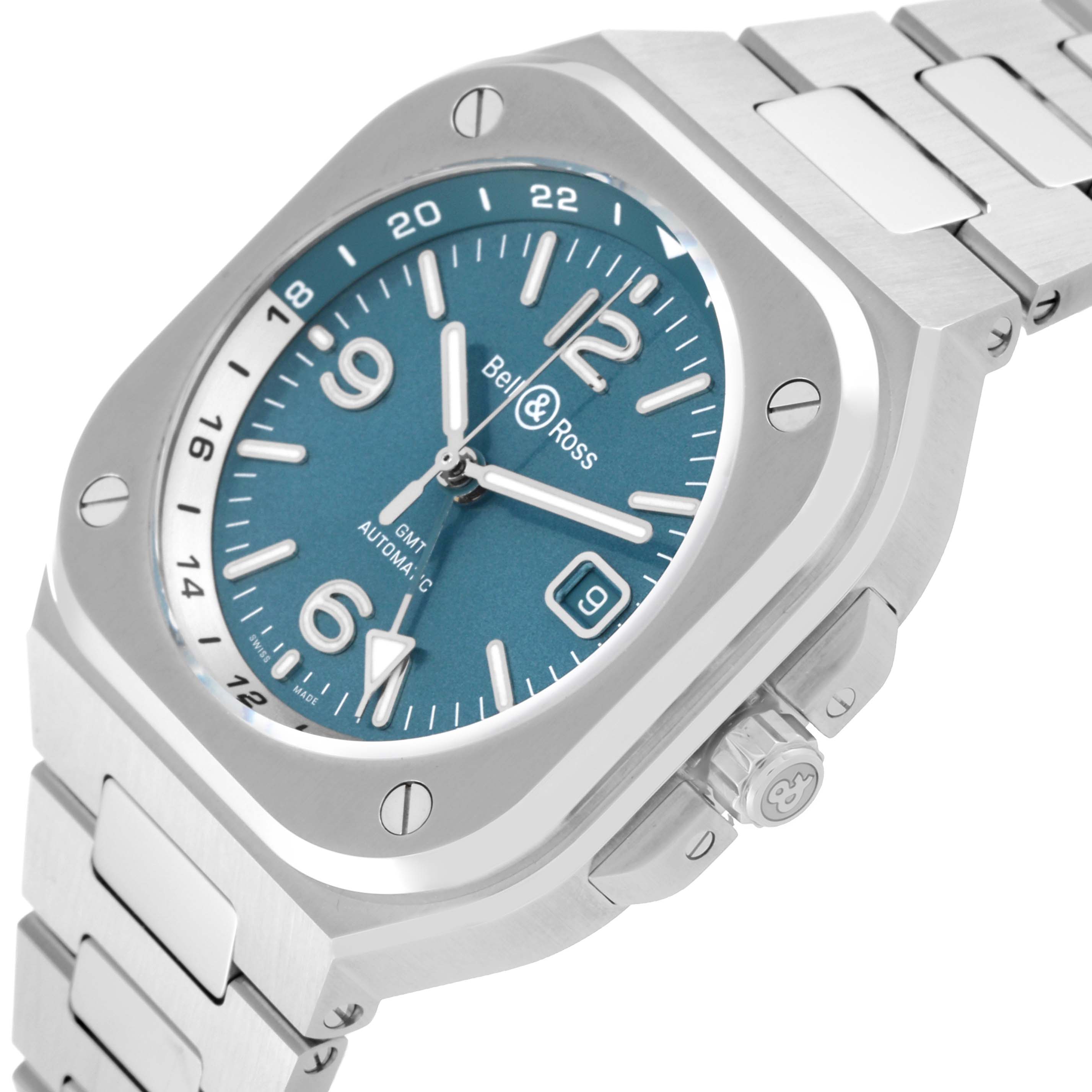 The image shows a close-up, angled view of the dial, bezel, crown, and part of the bracelet of a Bell 
Ross Chronograph watch.