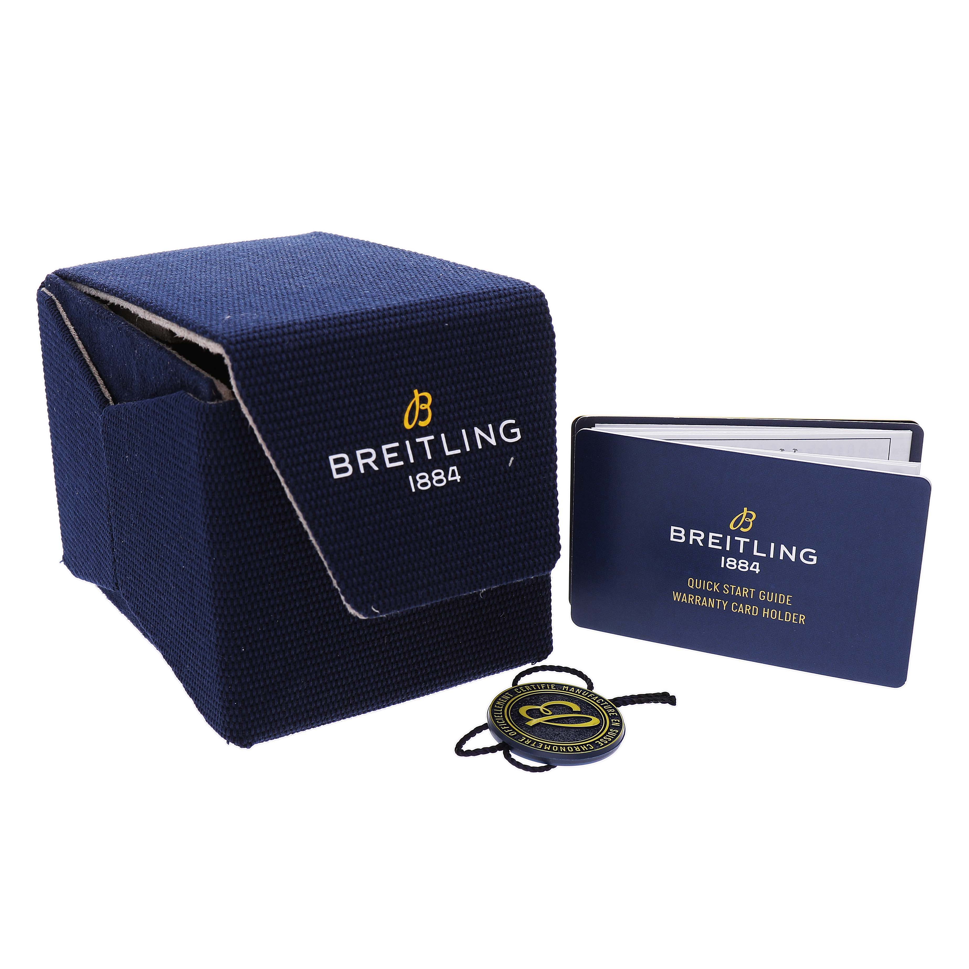 The image shows a Breitling Avenger EB0148101C1E1 Men's Titanium Blue Dial box, a quick start guide, and a warranty card holder.