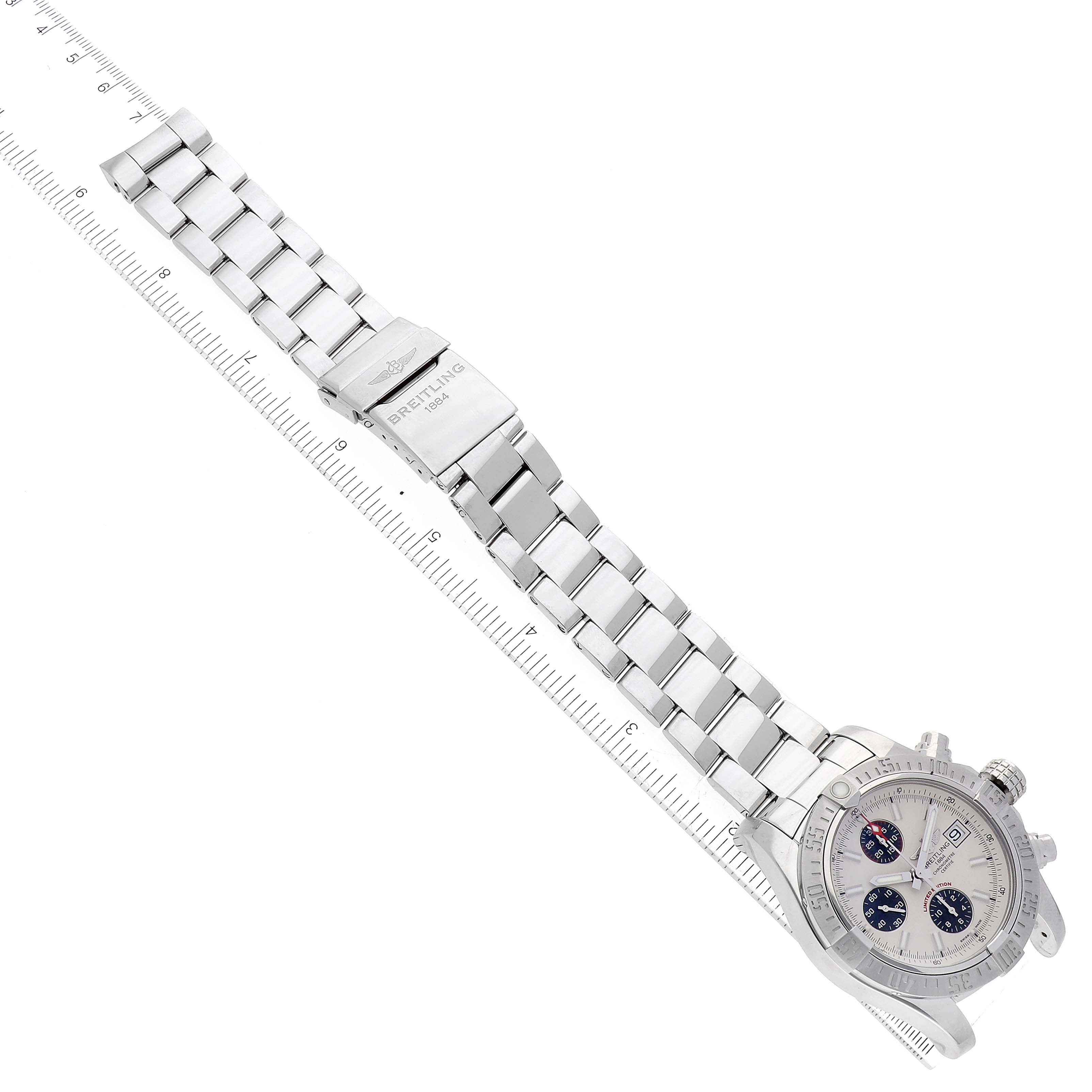 The image shows the Breitling Avenger A133813K/G809 Men's Stainless Steel White Dial A133813K/G809 Men's Stainless Steel White Dial watch at a diagonal angle, highlighting its face, bezel, and full metal bracelet with a clasp.