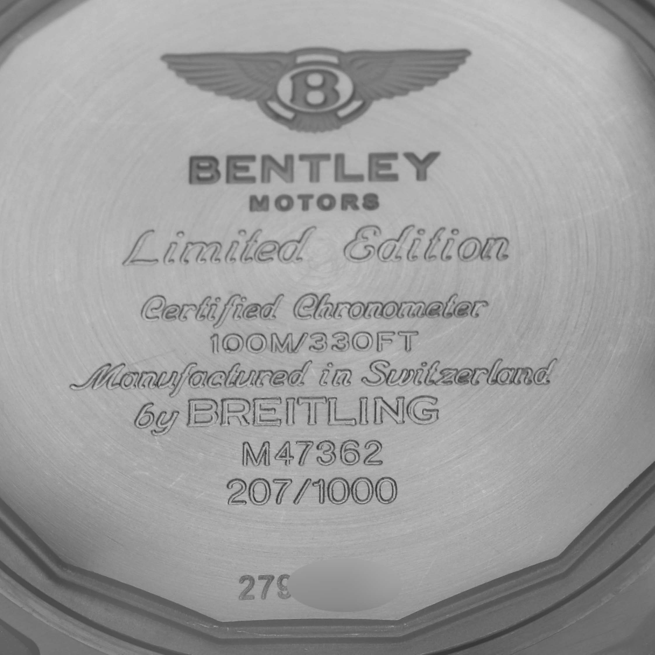 The image shows the back case of a Breitling Bentley M4736225/BC76 Men's Stainless Steel Black Dial M4736225/BC76 Men's Stainless Steel Black Dial Motors watch, highlighting its limited edition and model details.
