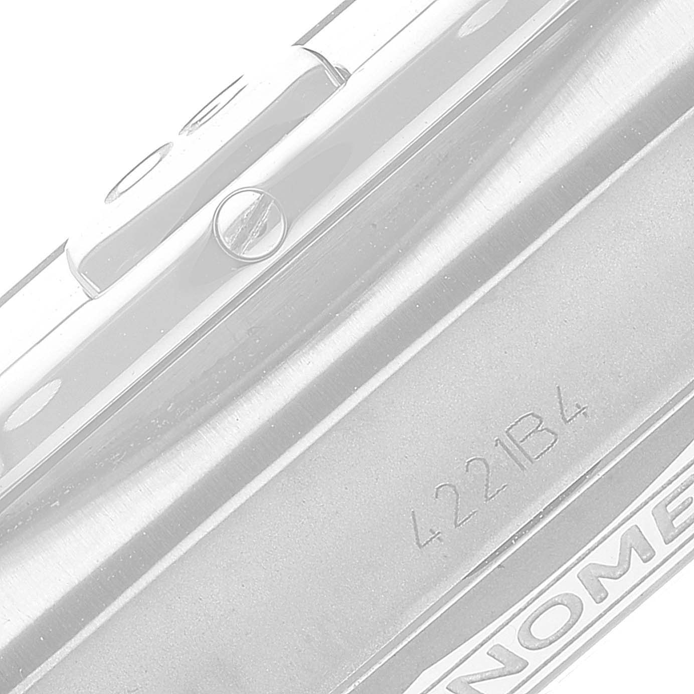 The image shows a close-up side view of the bezel and crown of a Breitling Chronomat AB0134101C1A1 Men's Stainless Steel Blue Dial AB0134101C1A1 Men's Stainless Steel Blue Dial watch.