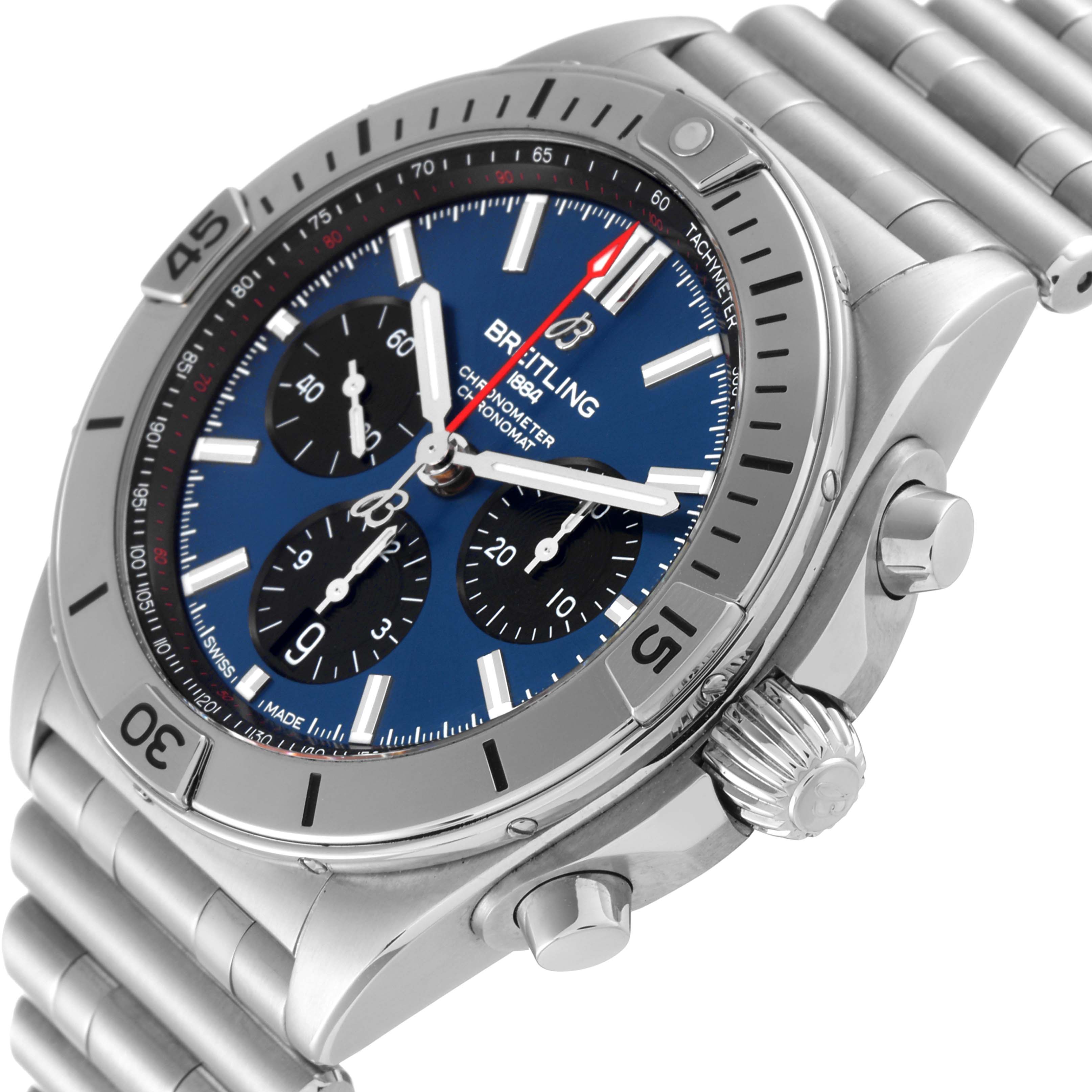 This Breitling Chronomat AB0134101C1A1 Men's Stainless Steel Blue Dial AB0134101C1A1 Men's Stainless Steel Blue Dial watch image is taken from a front-side angle, showcasing its face, crown, and part of the bracelet.