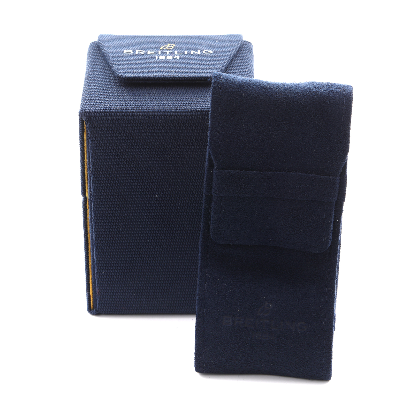 The image shows a navy blue box and pouch for the Breitling Chronomat AB0134101C1A1 Men's Stainless Steel Blue Dial AB0134101C1A1 Men's Stainless Steel Blue Dial watch, viewed from the front.