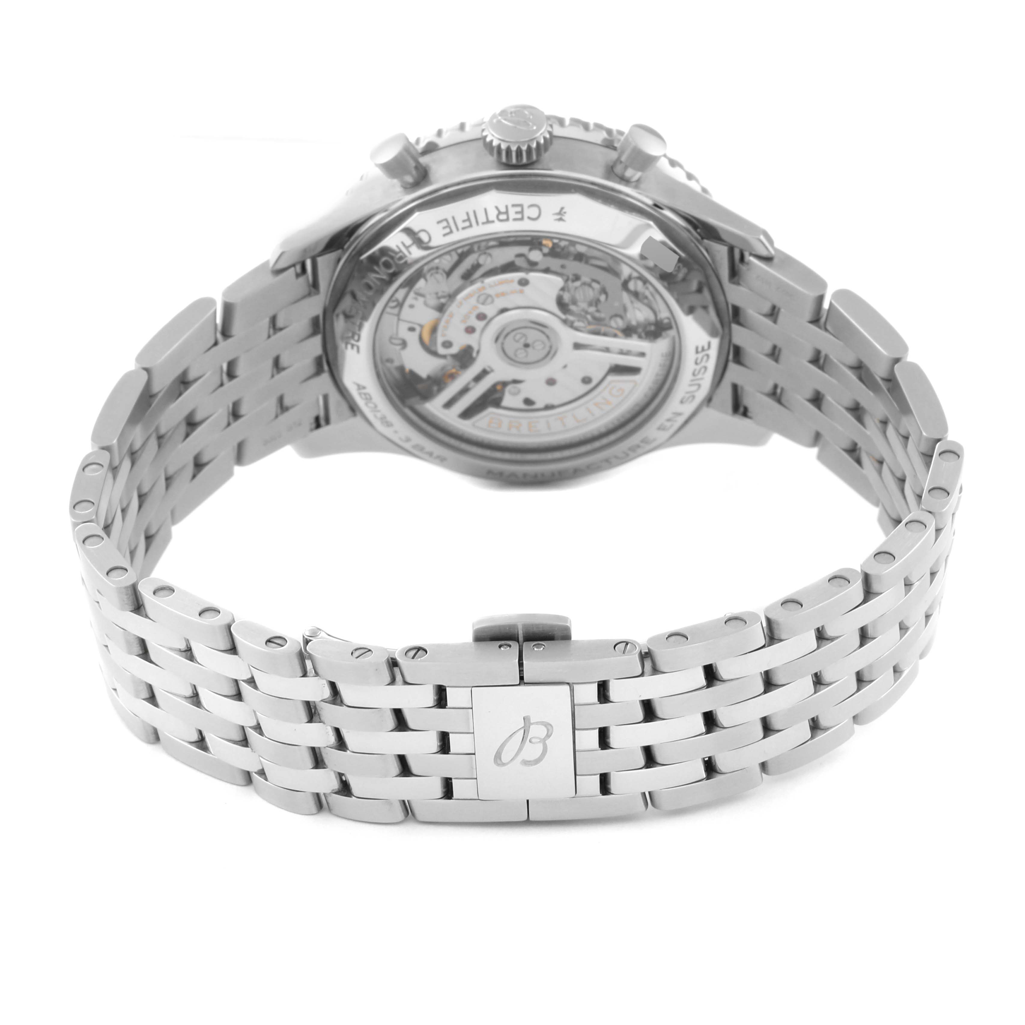 The image shows a Breitling Navitimer AB0138241C1A1 Men
s Stainless Steel Blue Dial AB0138241C1A1 Men
s Stainless Steel Blue Dial watch from the back, highlighting its exposed movement and stainless steel bracelet.