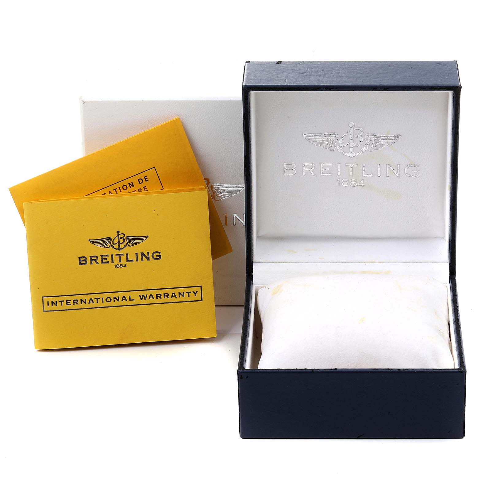This image shows the empty box, international warranty card, and documentation for a Breitling Superocean A17321 Men
s Stainless Steel White Dial A17321 Men
s Stainless Steel White Dial watch.
