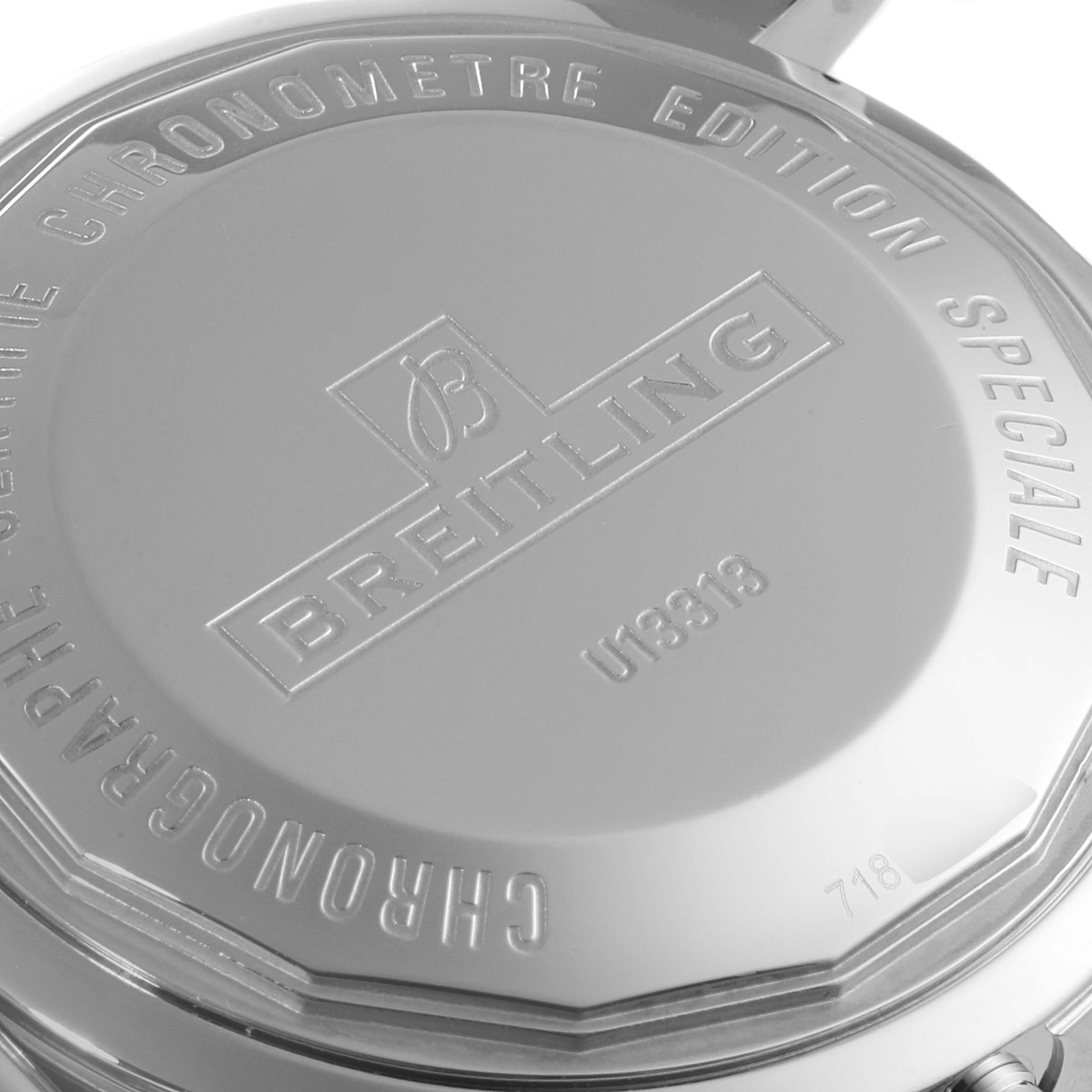 This is a close-up view of the case back of a Breitling Superocean U13313121B1A1 Men's Steel and Gold (two tone) Black Dial U13313121B1A1 Men's Steel and Gold (two tone) Black Dial watch, showing the engraved branding and text.