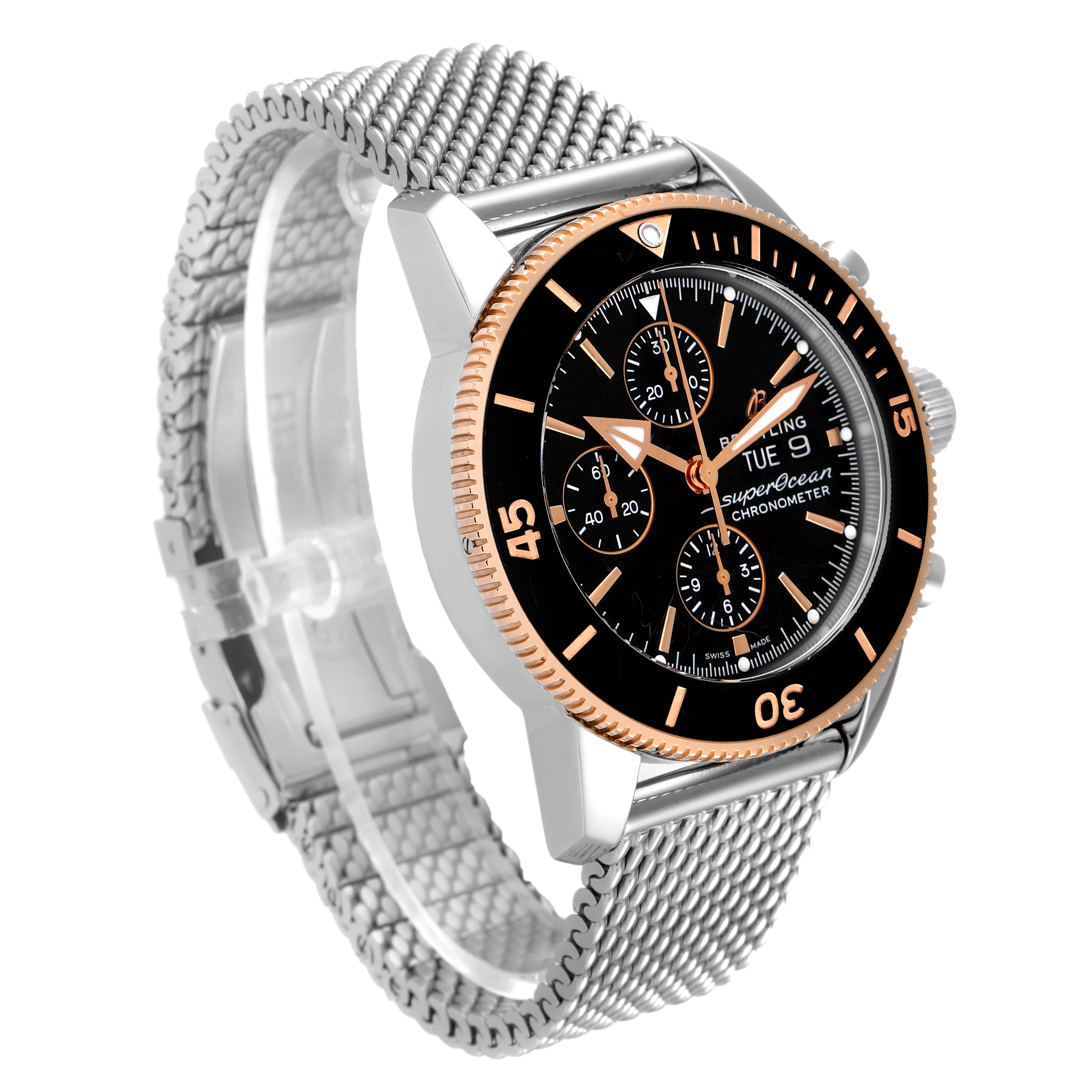 This is a Breitling Superocean U13313121B1A1 Men's Steel and Gold (two tone) Black Dial U13313121B1A1 Men's Steel and Gold (two tone) Black Dial watch, shown from a front-side angle, featuring its dial, bezel, pushers, and mesh bracelet.