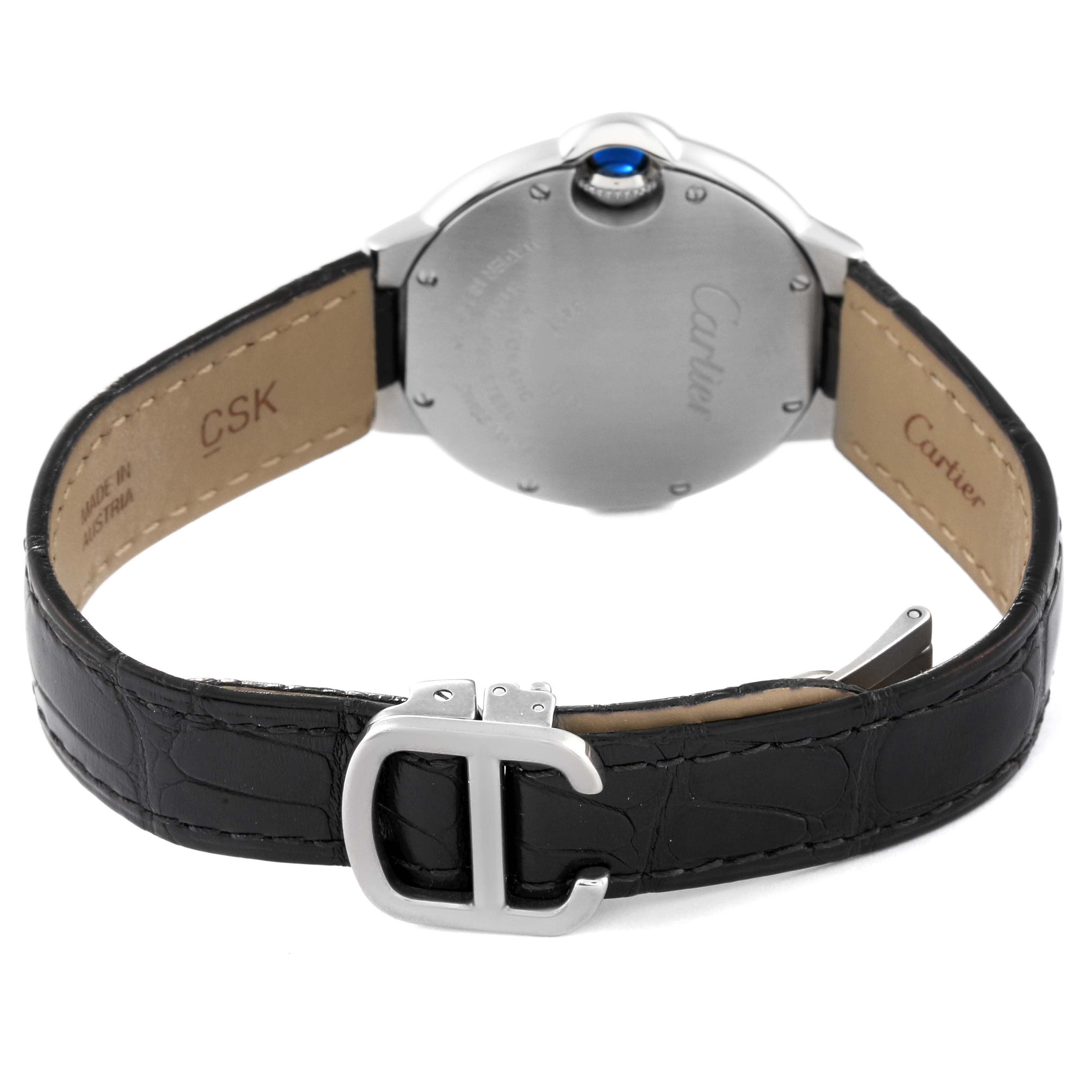 The image shows the back view of a Cartier Ballon Bleu W6920085 Women's Stainless Steel Silver Dial W6920085 Women's Stainless Steel Silver Dial watch featuring its case back, crown, and leather strap with a buckle.