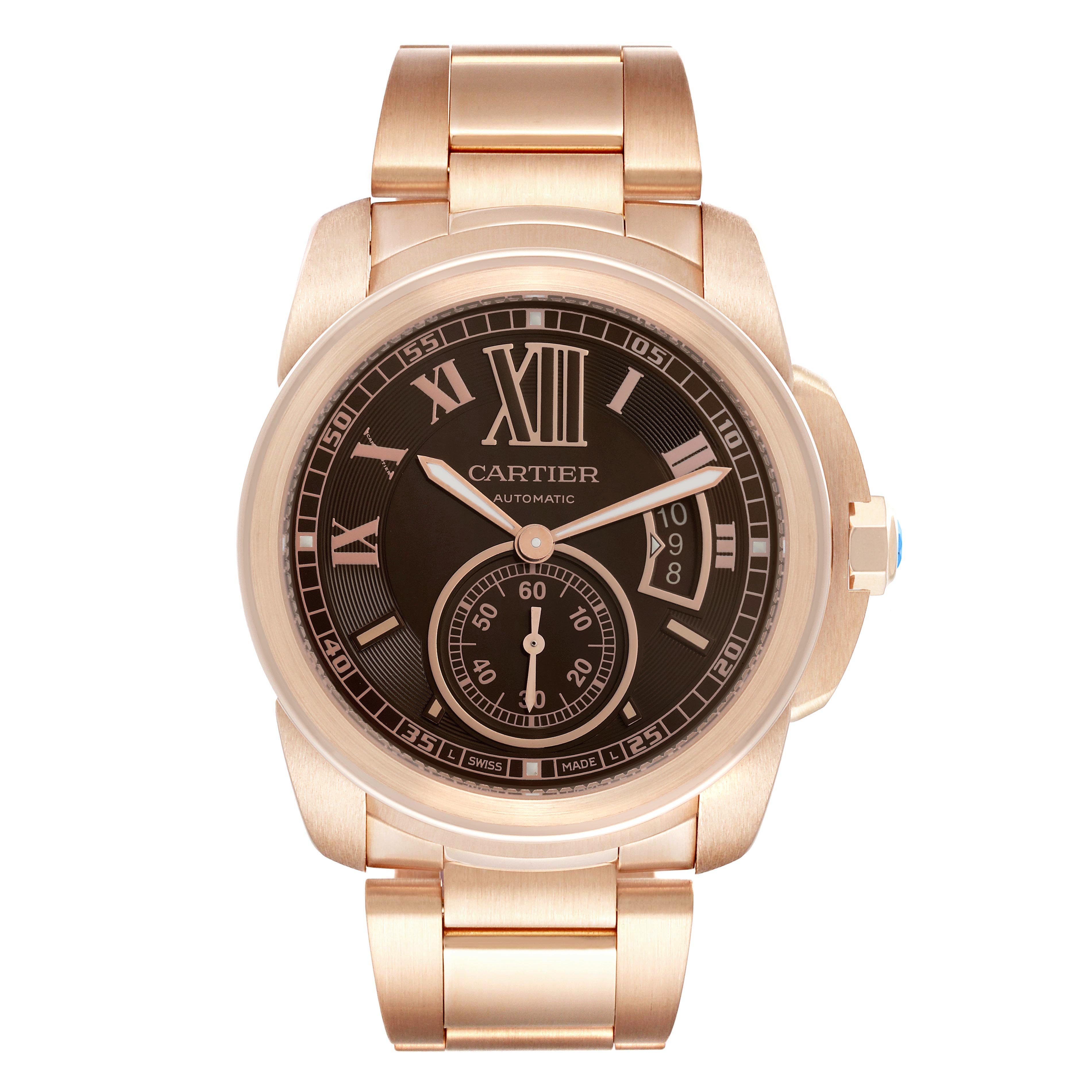 The Calibre de Cartier by Cartier is shown from a front angle, displaying the watch face and bracelet.