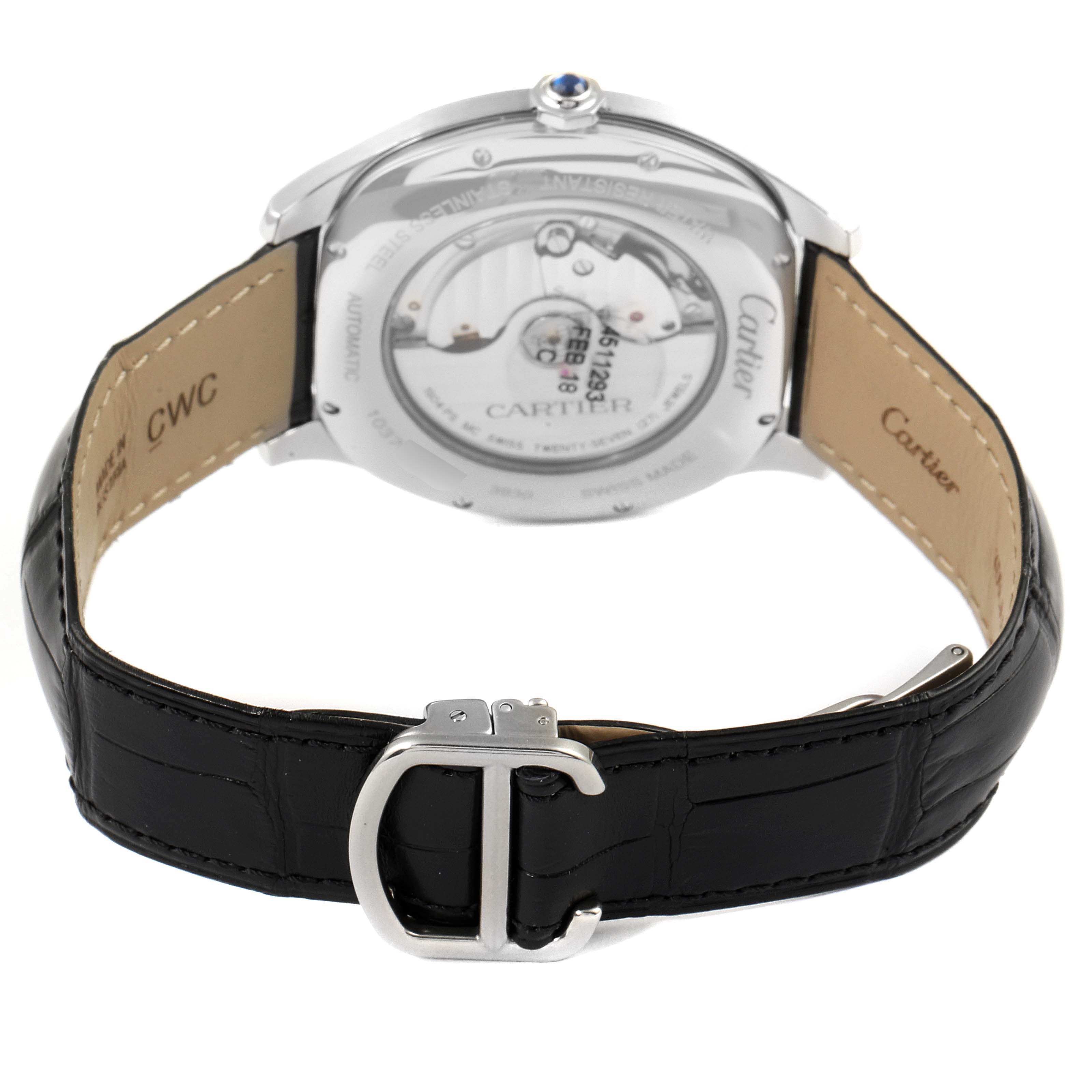 The image shows the back view of a Drive de Cartier watch by Cartier, highlighting the open case back and black leather strap with buckle.