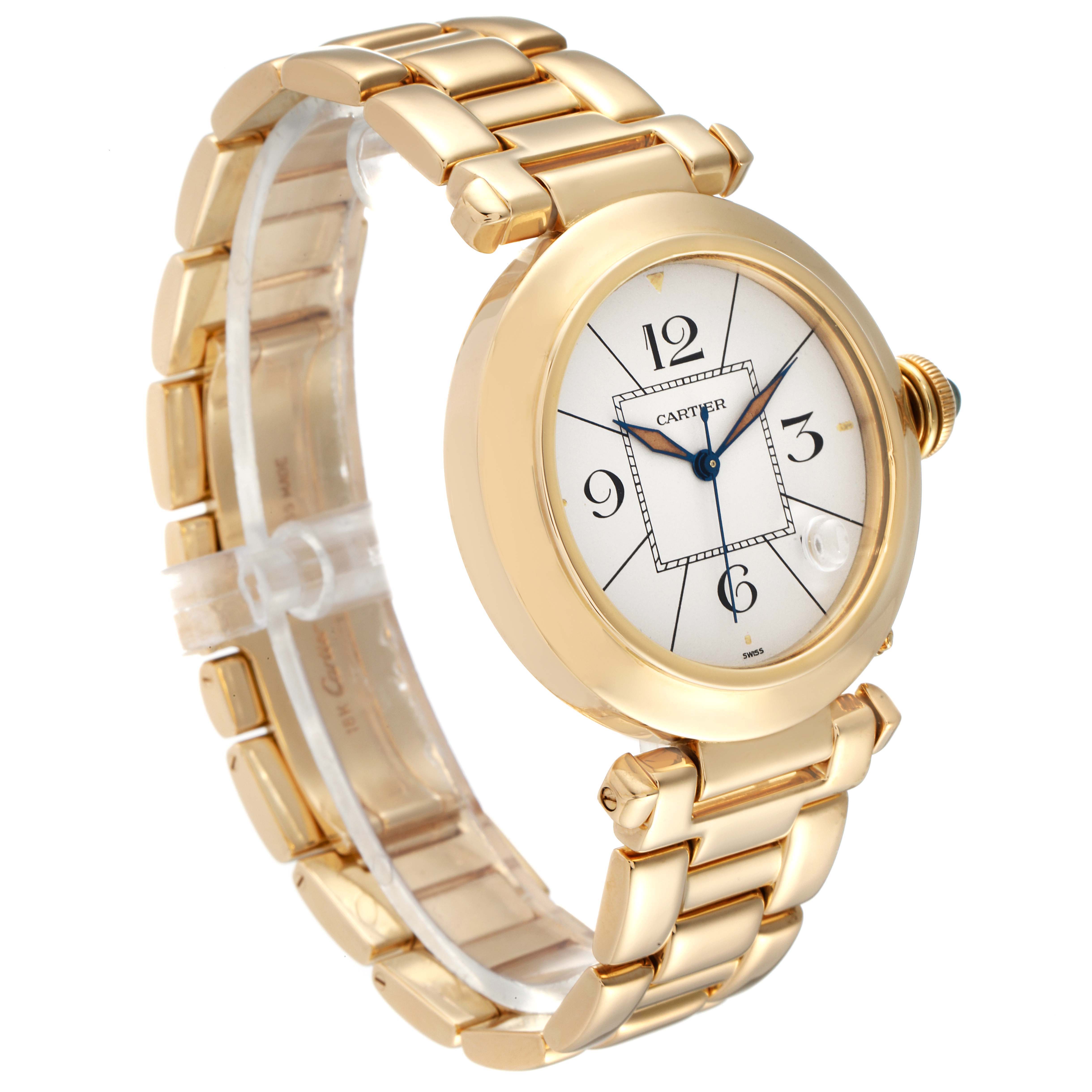 The image shows the Cartier Pasha 1989 Men's Yellow Gold Silver Dial 1989 Men's Yellow Gold Silver Dial watch at an angled side view, highlighting its gold bracelet and round dial with blue hands.