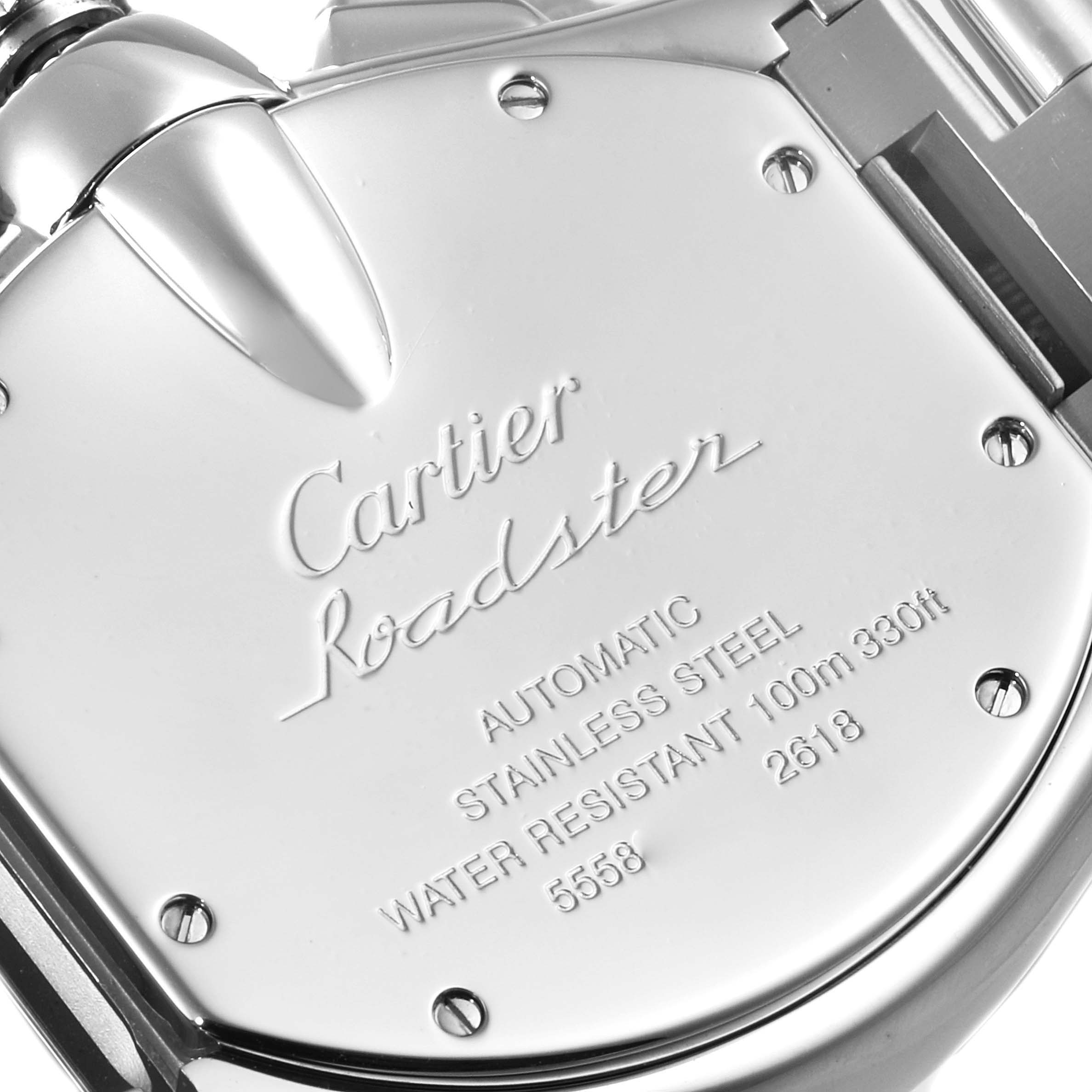 The image shows the stainless steel case back of a Cartier Roadster W62007X6 Men
s Stainless Steel Black Dial W62007X6 Men
s Stainless Steel Black Dial watch, highlighting its features and engravings.