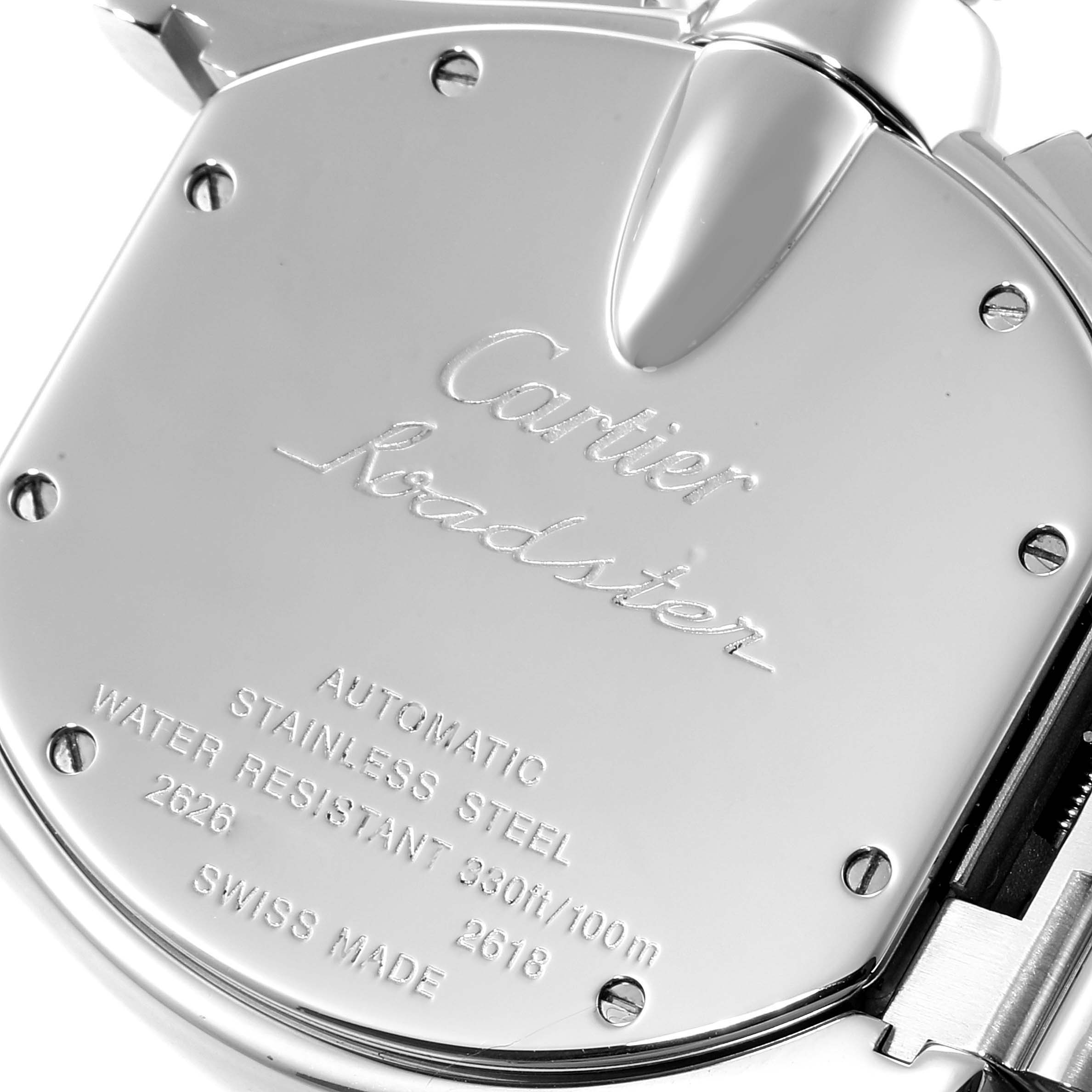 This image shows the back case of a Cartier Roadster W62019X6 Men
s Stainless Steel Silver Dial W62019X6 Men
s Stainless Steel Silver Dial model watch, highlighting engravings and screws.