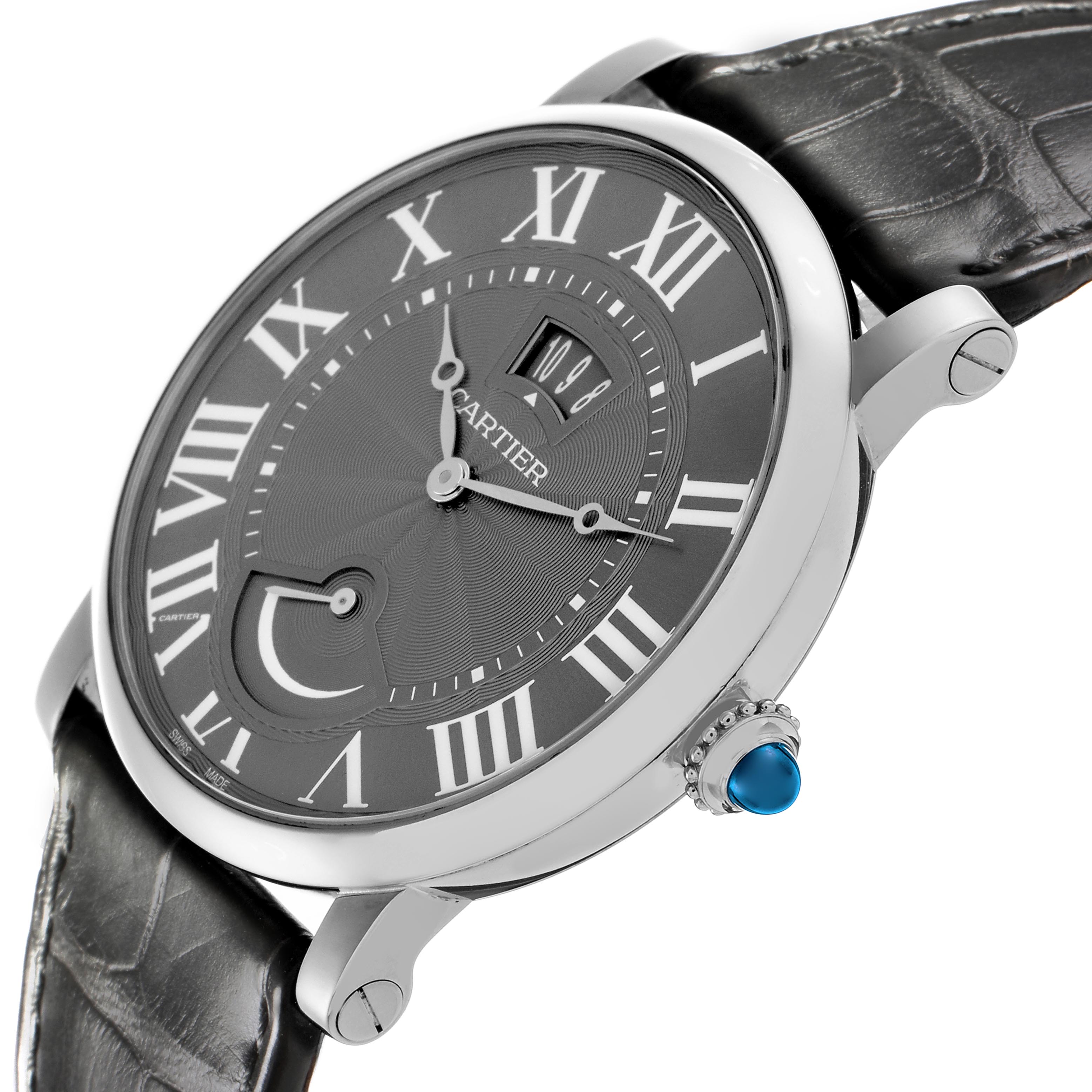 The Rotonde de Cartier watch is shown at a slight side angle, highlighting the face, crown, and black leather strap.