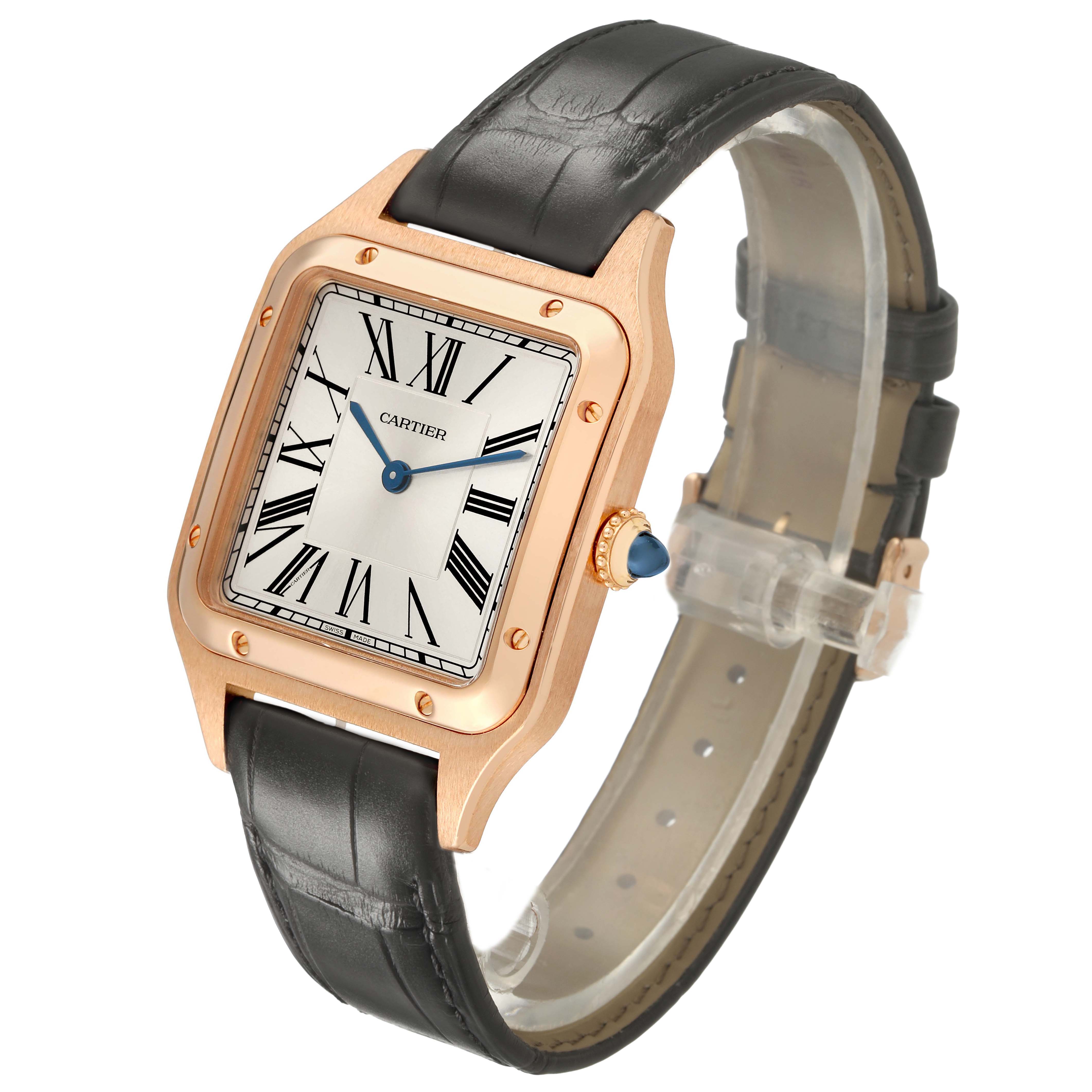 The Cartier Santos Dumont WGSA0021 Men's Rose Gold Silver Dial watch is shown at an angle emphasizing its face, Roman numerals, crown, and leather strap.