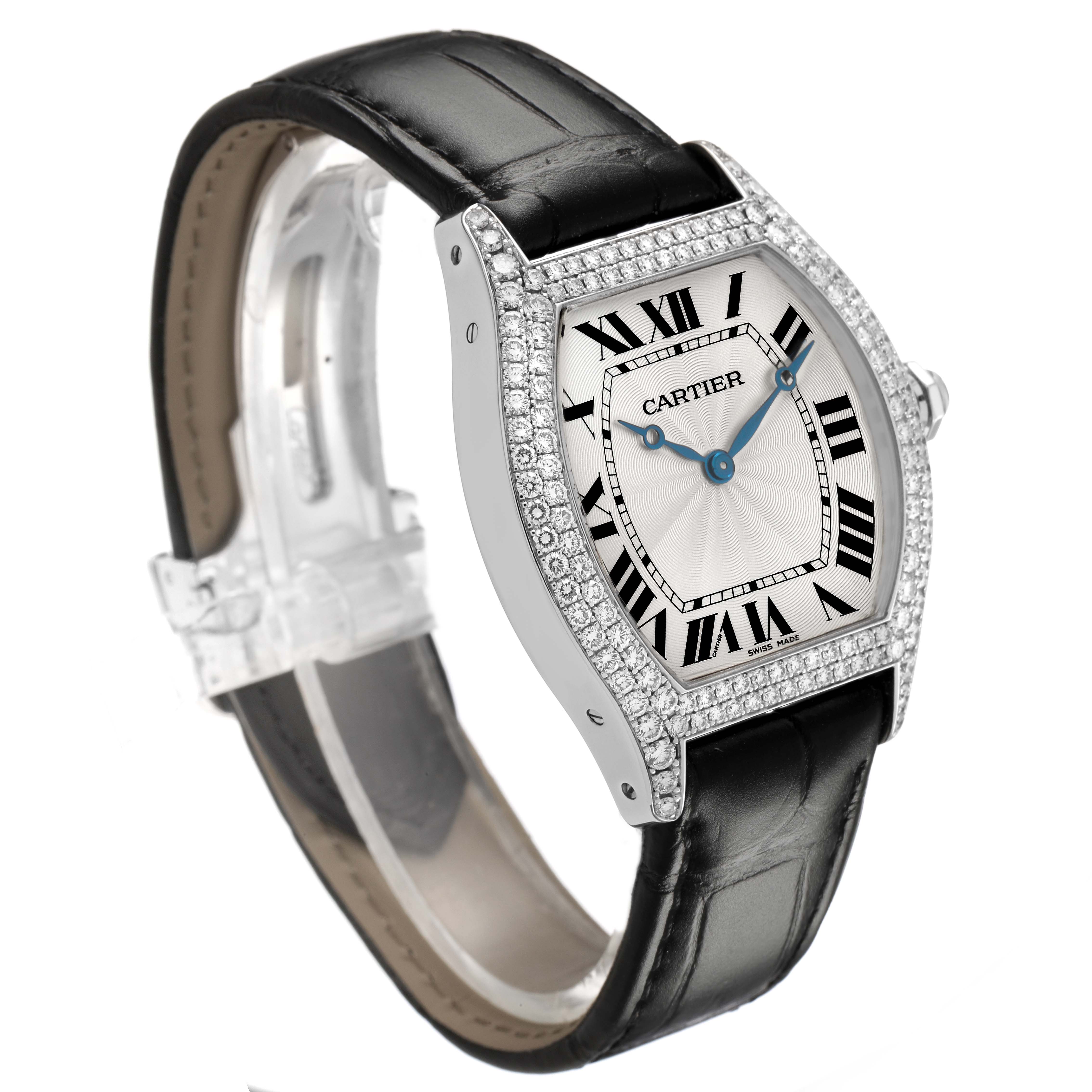 The Cartier Tortue WA503851 Men's White Gold Silver Dial watch is shown at a three-quarter angle, displaying the dial, roman numerals, diamond bezel, and leather strap.