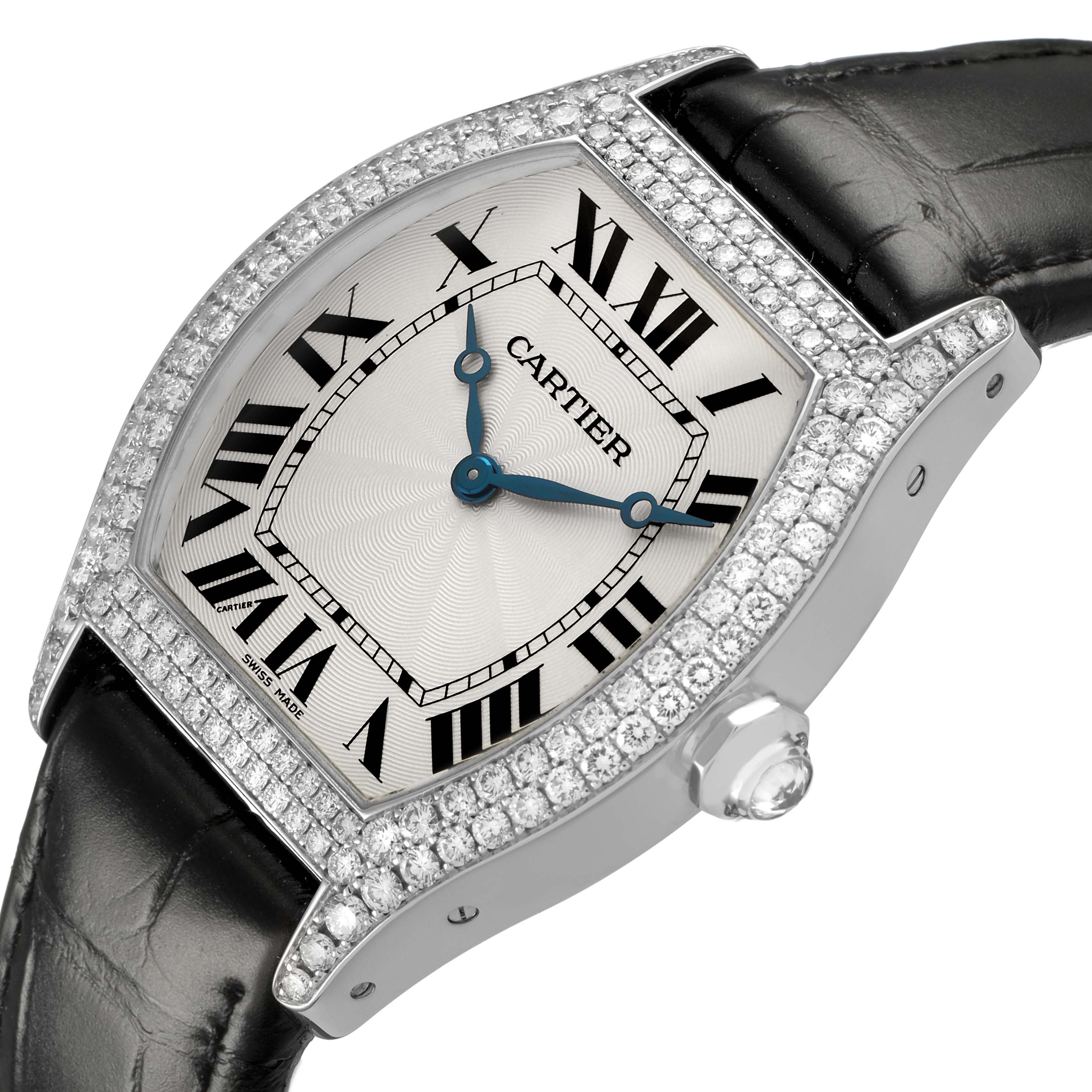 The Cartier Tortue WA503851 Men's White Gold Silver Dial watch is shown from a slight side angle, highlighting the diamond-studded case, dial, and part of the leather strap.