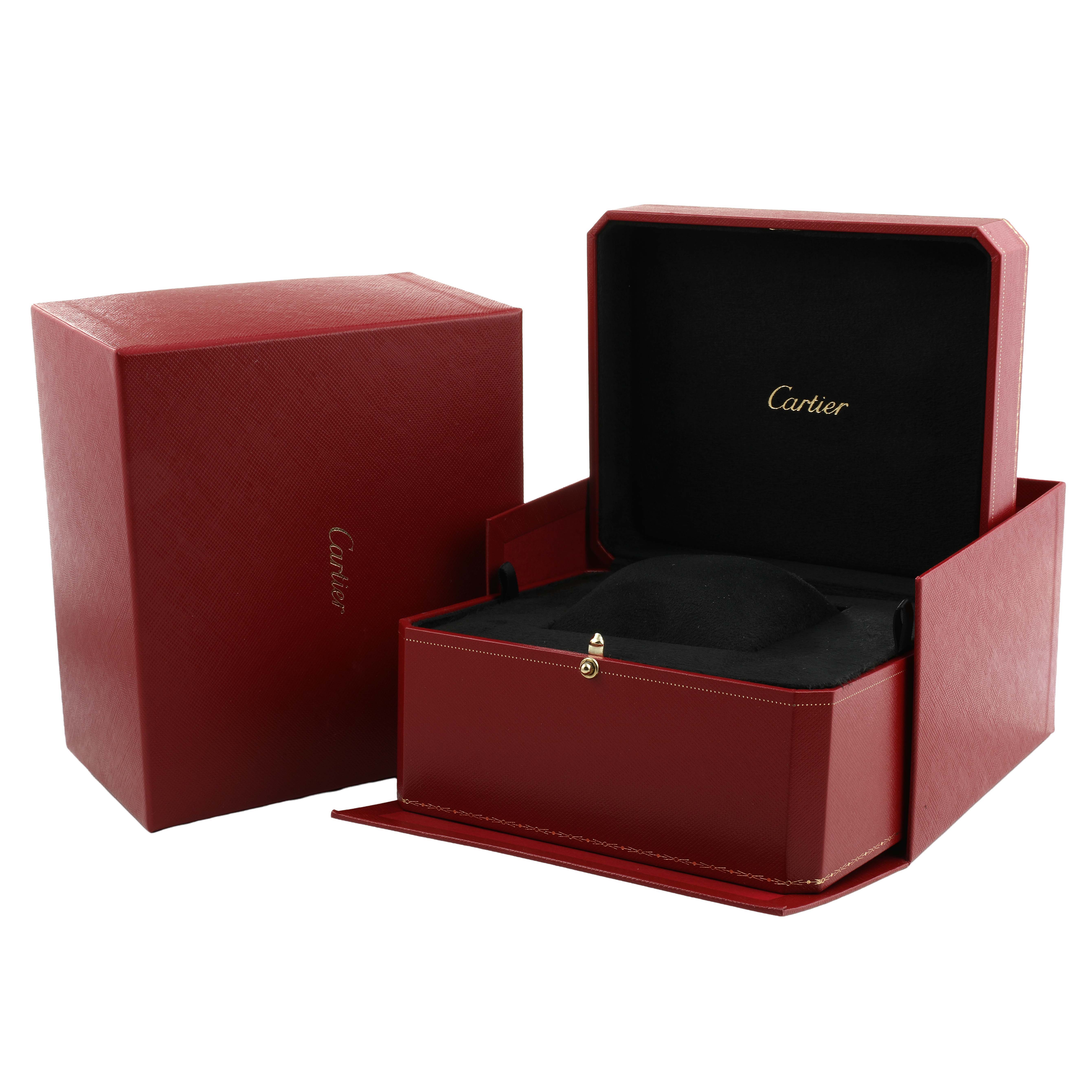 The image shows a red Cartier watch box for the Tortue model, with an open lid revealing a black interior.
