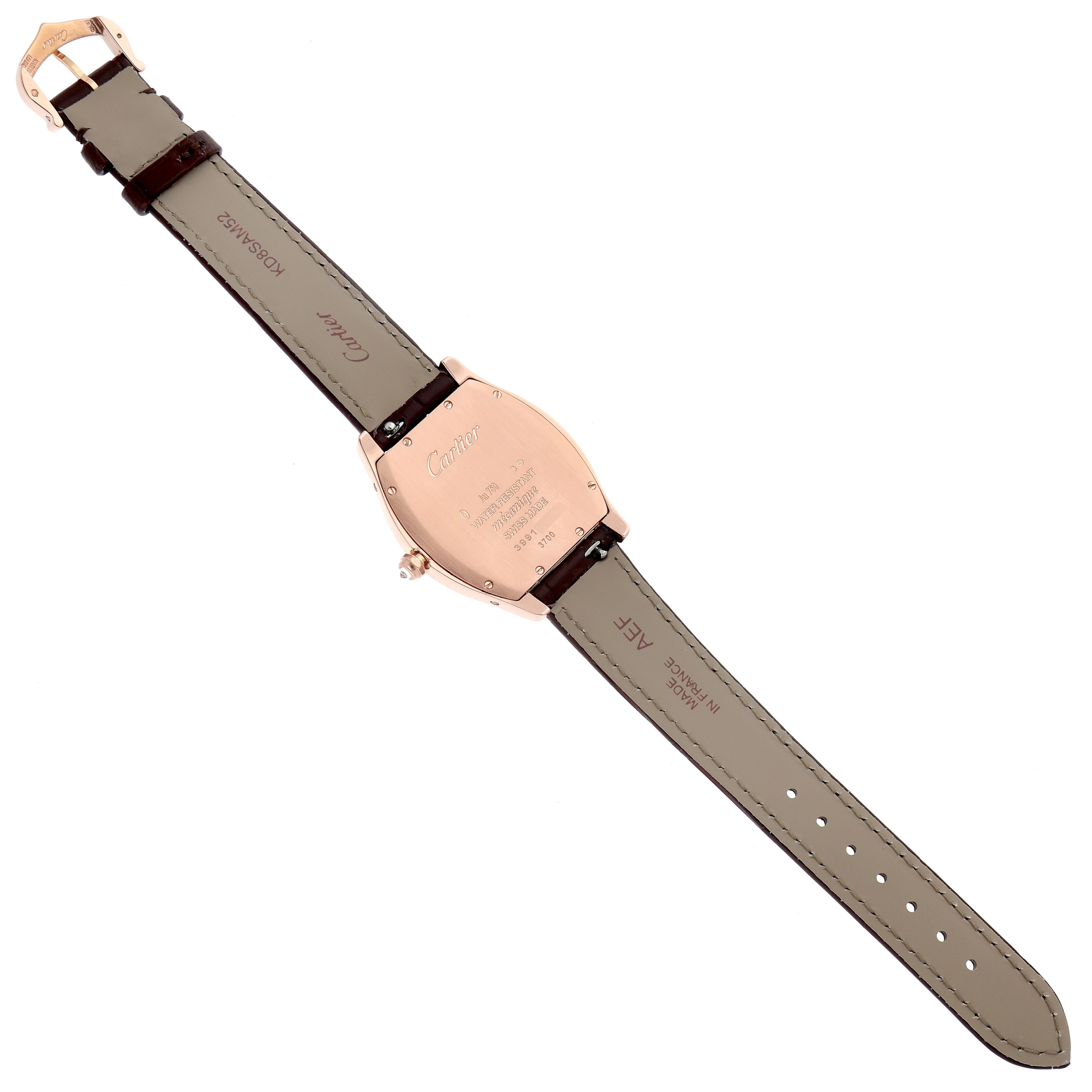 The Cartier Tortue WJTO0009 Women's Rose Gold Silver Dial WJTO0009 Women's Rose Gold Silver Dial watch is shown from the back, displaying the caseback and the leather strap.