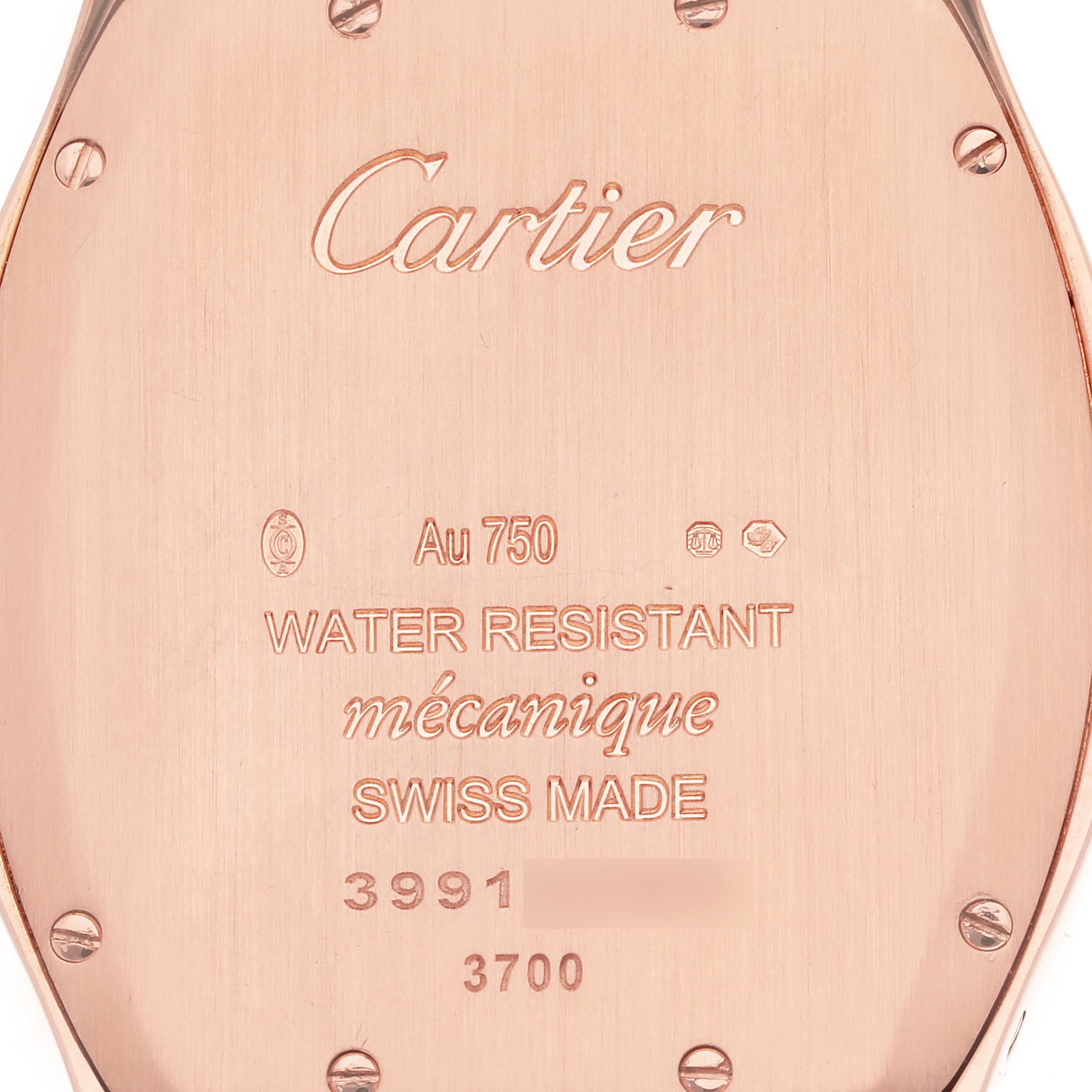 The image shows the back of a Cartier Tortue WJTO0009 Women's Rose Gold Silver Dial WJTO0009 Women's Rose Gold Silver Dial watch, displaying engraving details and screws.