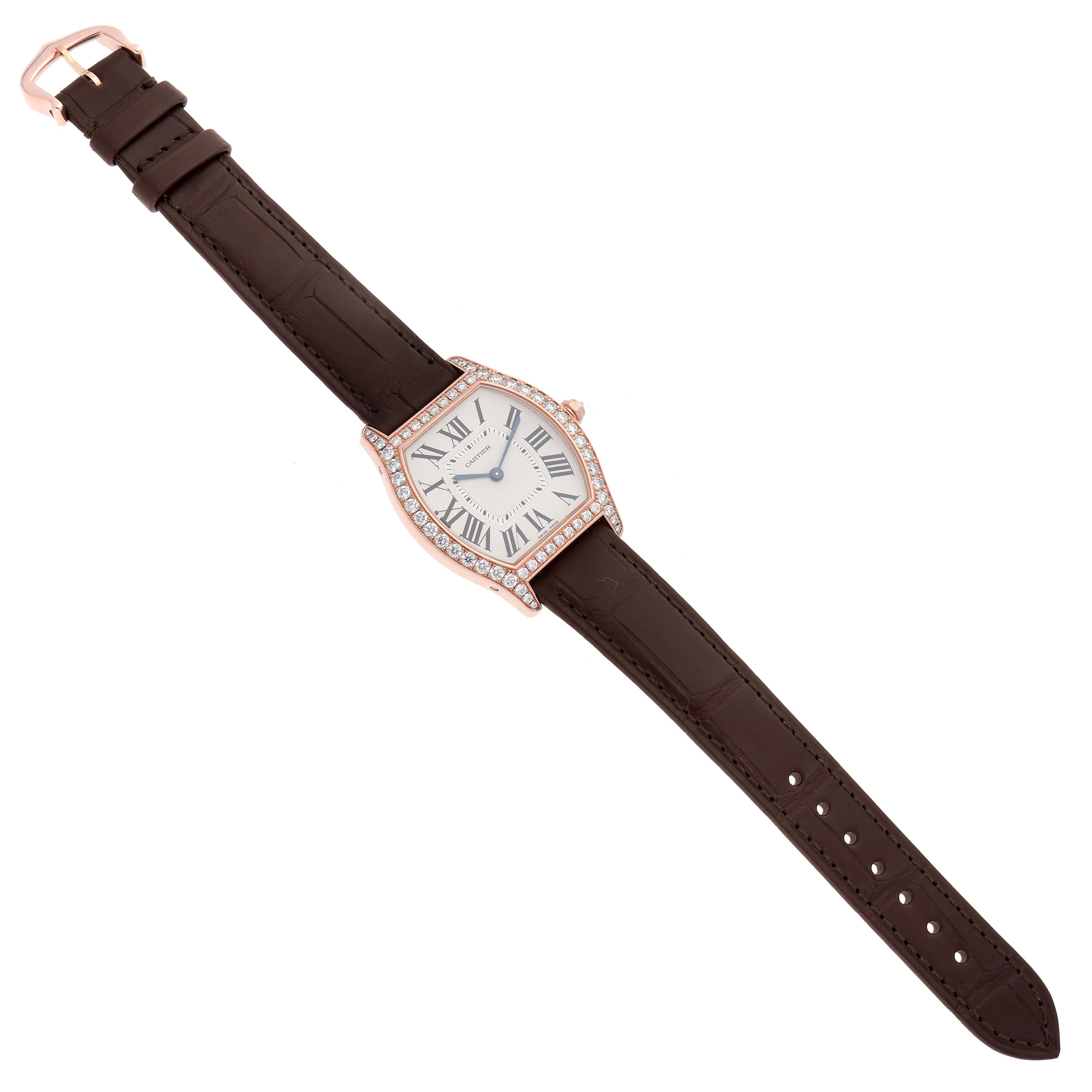 The Cartier Tortue WJTO0009 Women's Rose Gold Silver Dial WJTO0009 Women's Rose Gold Silver Dial watch is shown from a top-down angle, displaying its face, strap, and diamond-set case.