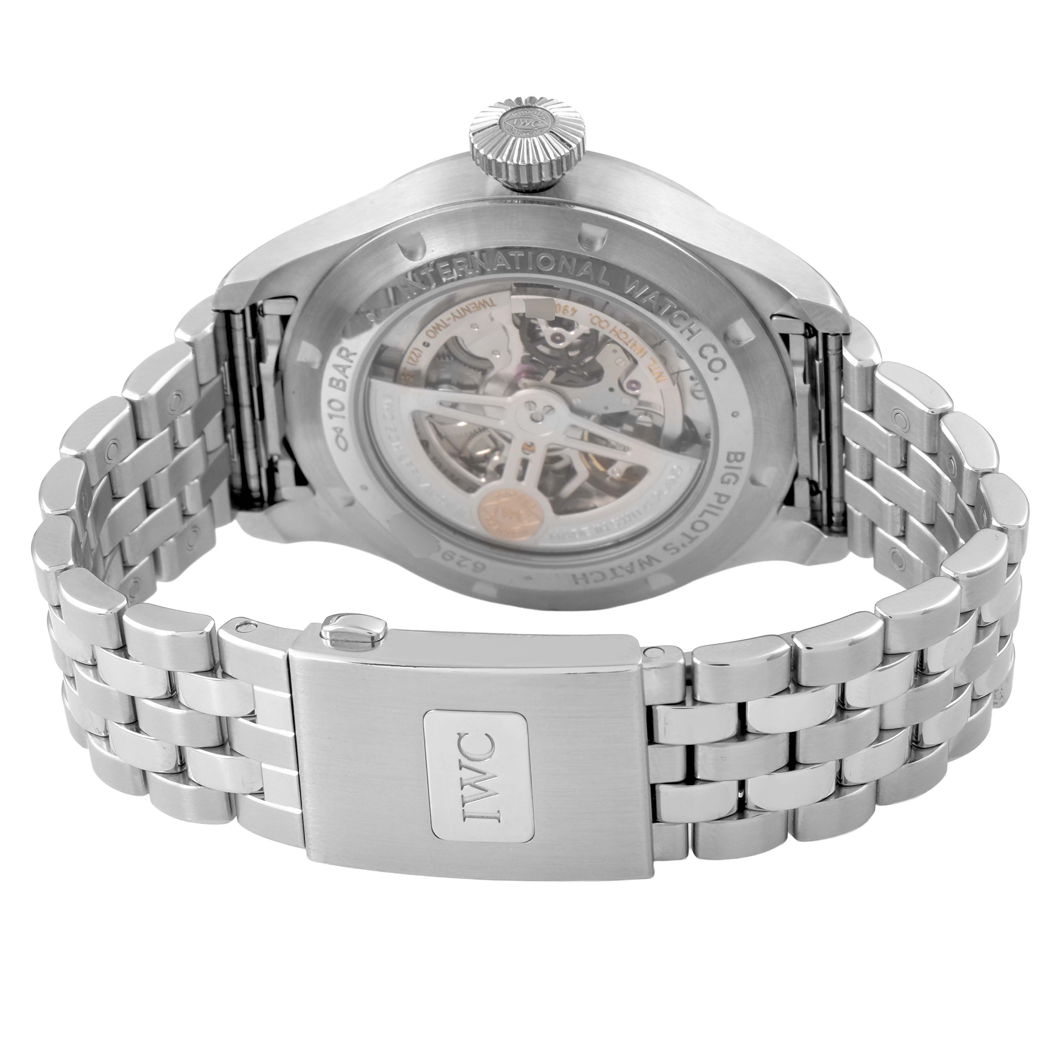 The image shows the back view of an IWC Pilot IW329301 Men's Stainless Steel Black Dial model watch, highlighting its open case back and metal bracelet.