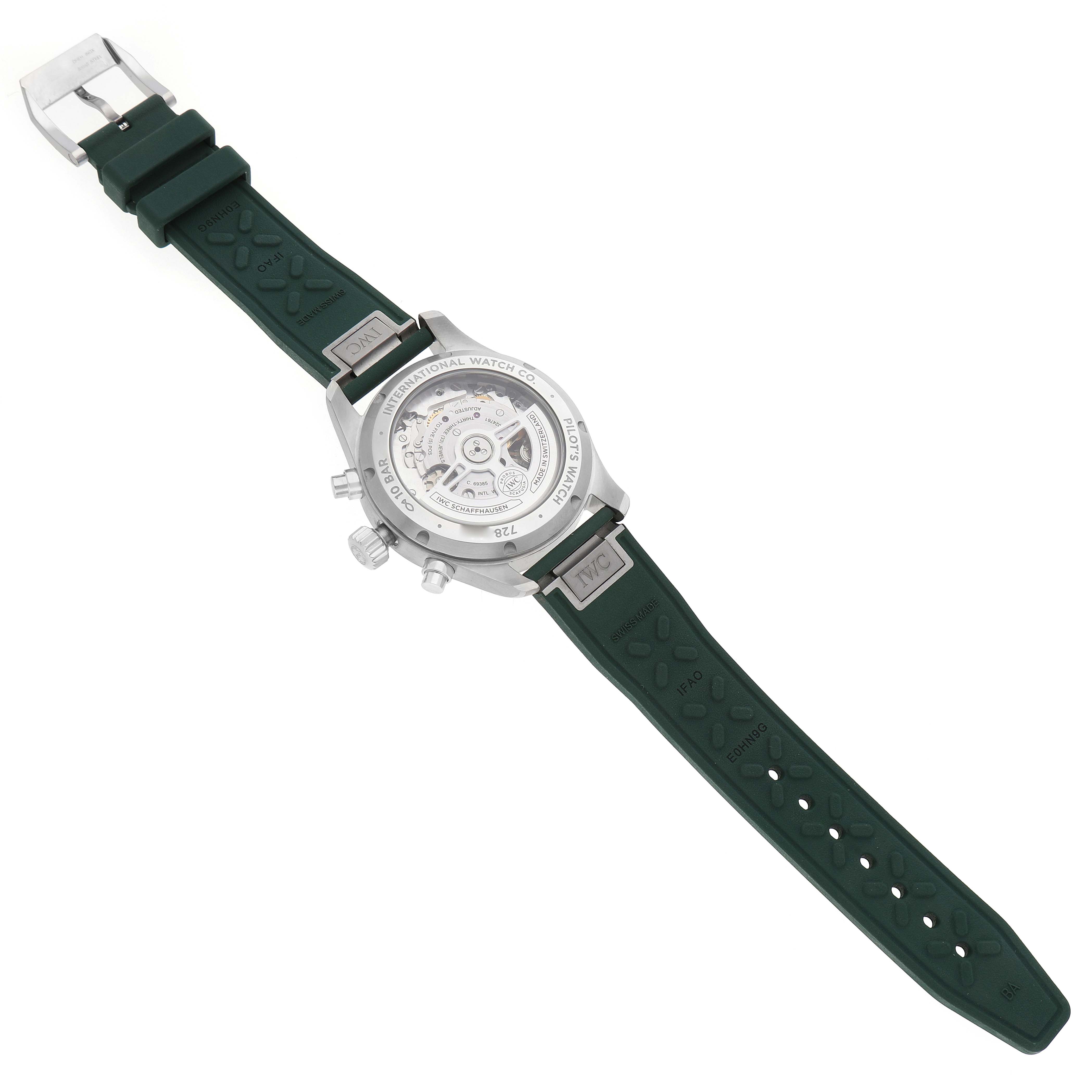 The IWC Pilot IW388103 Men's Stainless Steel Green Dial model watch is shown from the back, displaying the open case back and green strap.