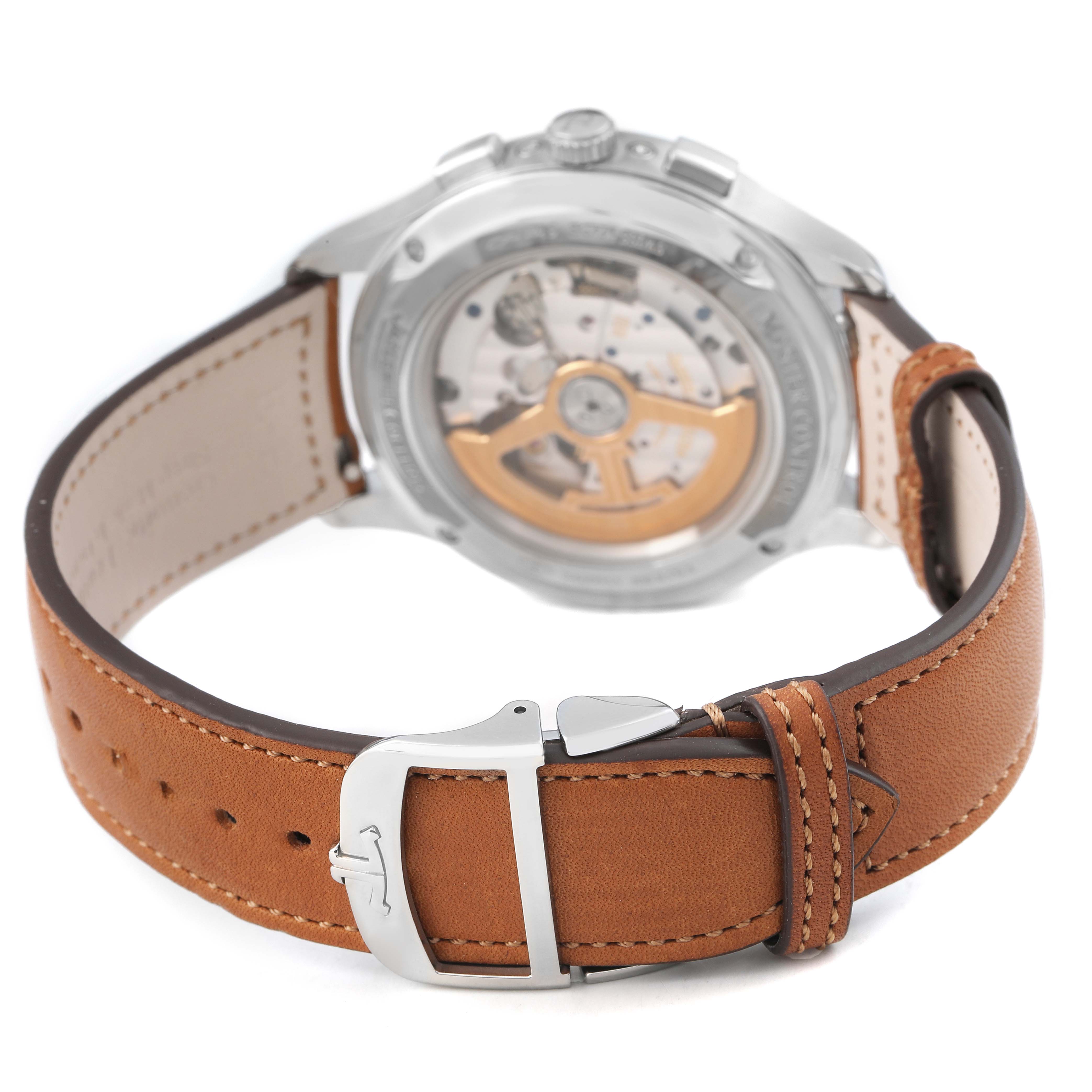 The image shows the back of the Jaeger LeCoultre Master Q4138420 Men's Stainless Steel Silver Dial watch, highlighting the movement and brown leather strap.