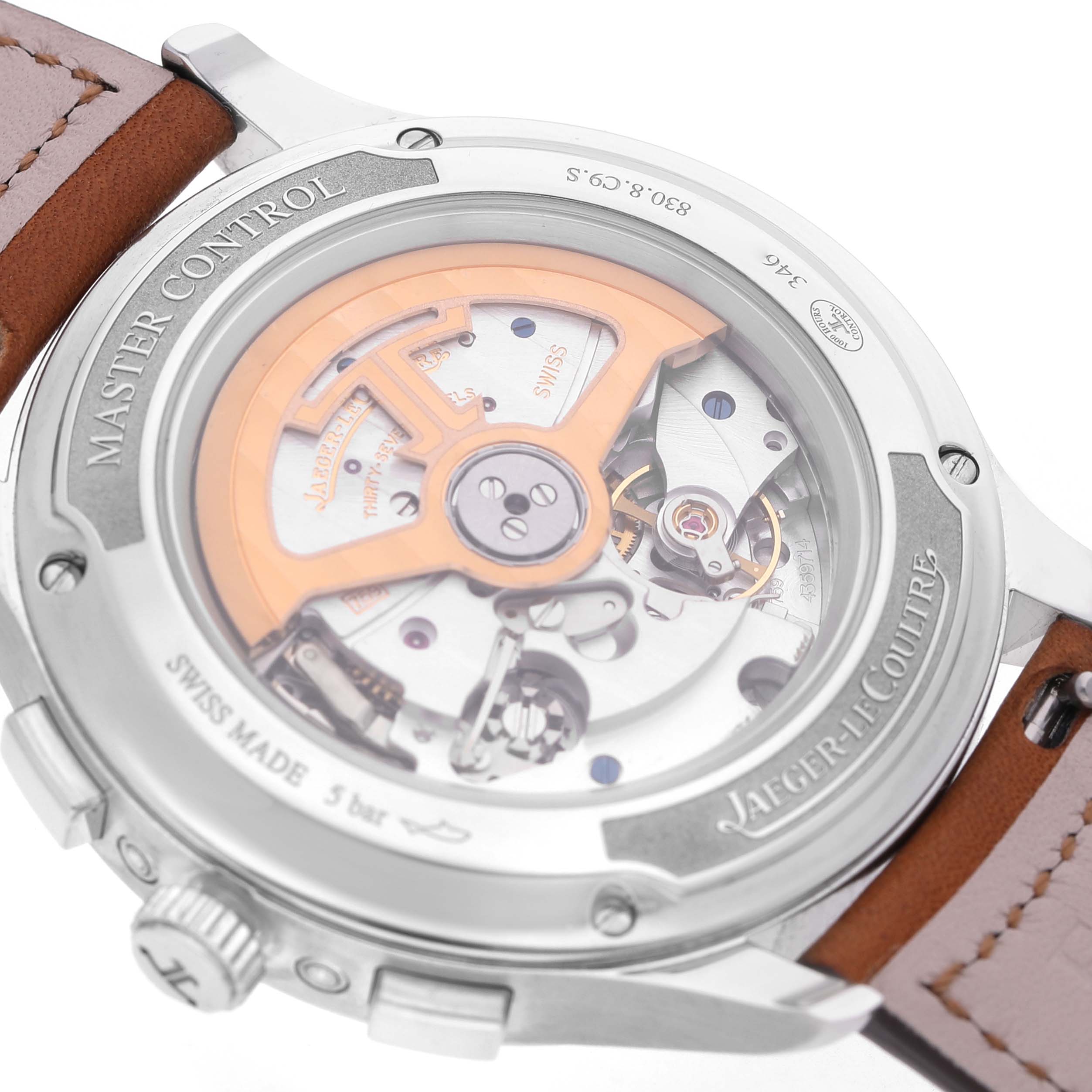 The image shows the back of a Jaeger LeCoultre Master Q4138420 Men's Stainless Steel Silver Dial model watch, highlighting its movement and rotor through a transparent case back.