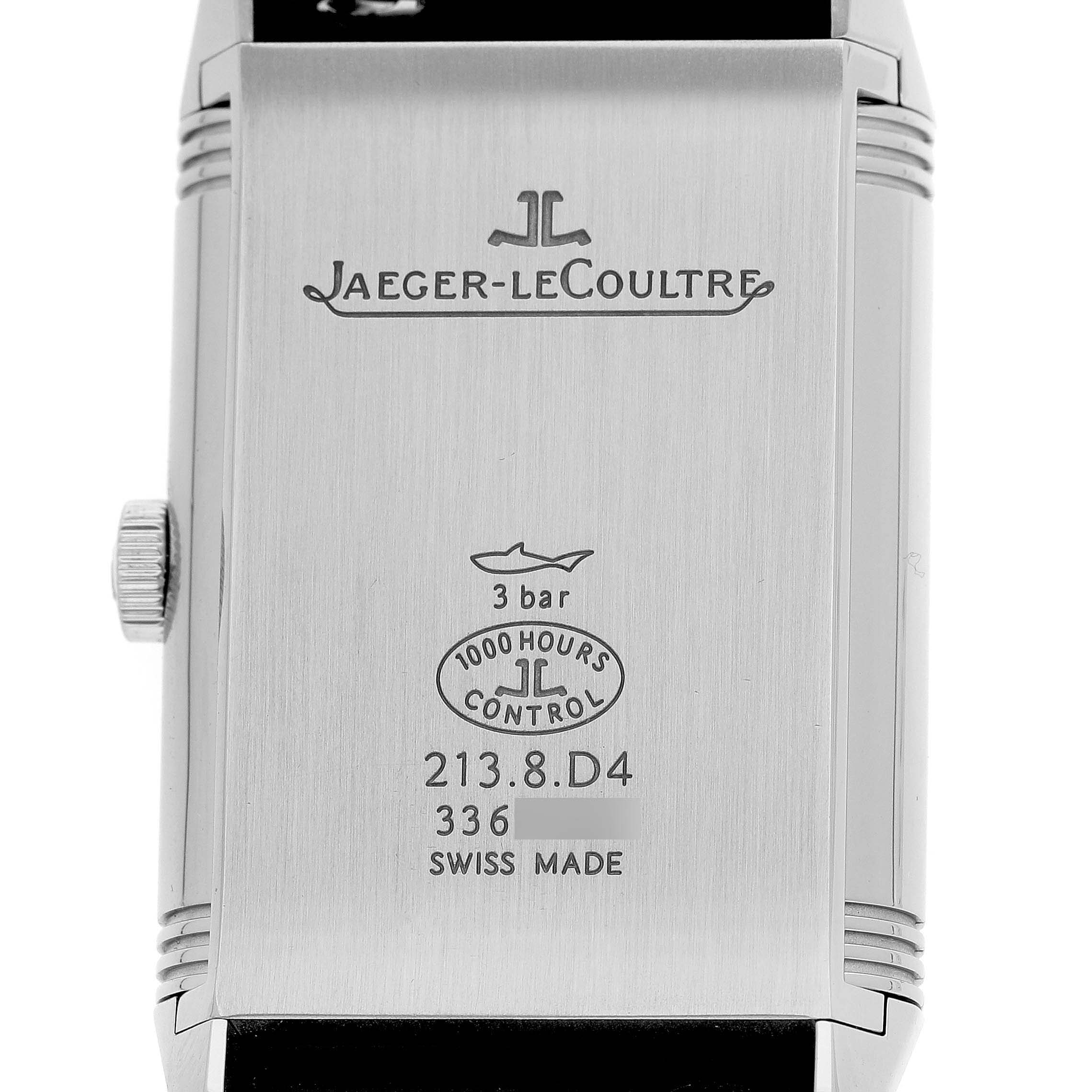 The image shows the back of a Jaeger-LeCoultre Reverso watch, featuring the brand logo, model number, and water resistance details.