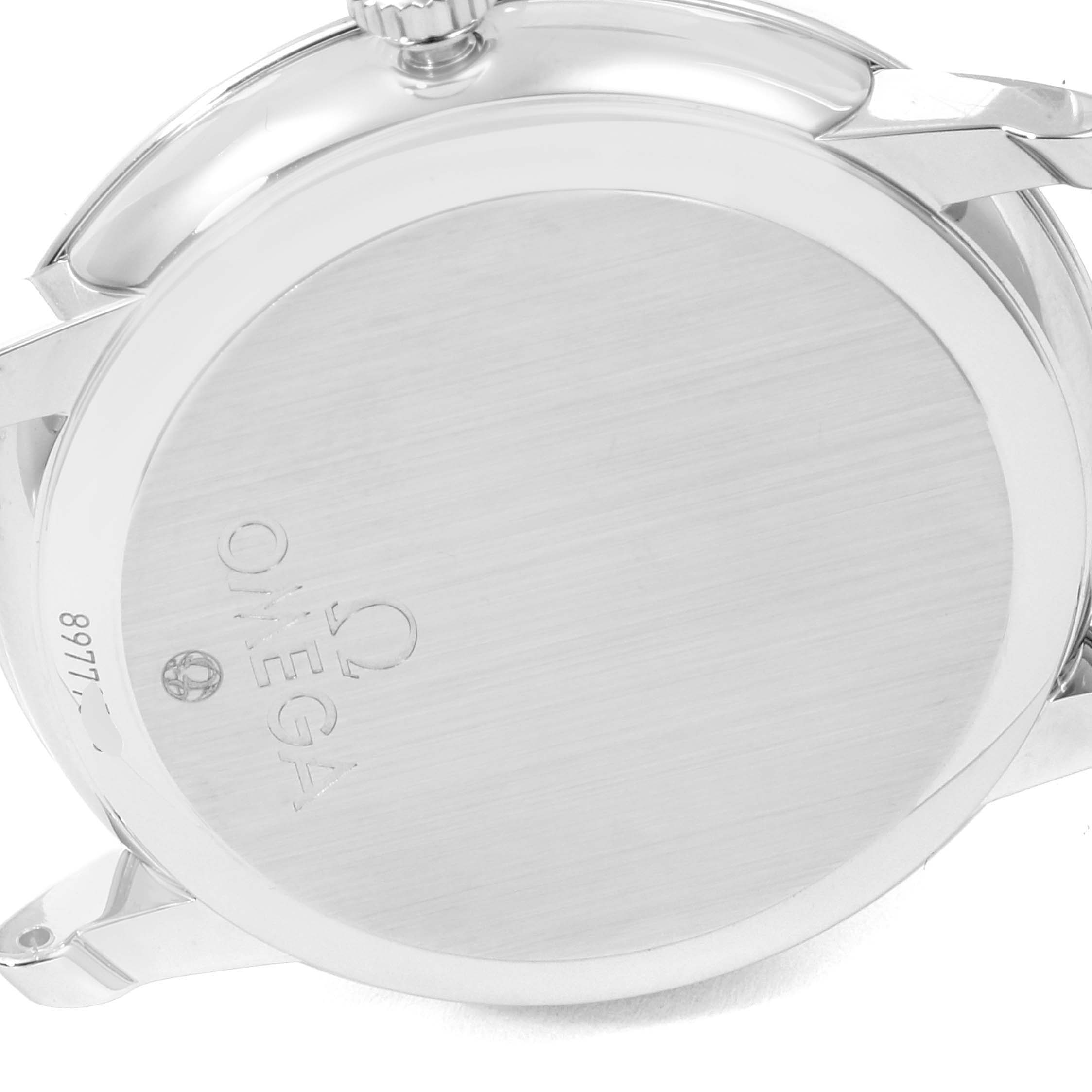 The image shows the back case and crown of an Omega De Ville 424.13.40.20.01.001 Men's Stainless Steel Black Dial 424.13.40.20.01.001 Men's Stainless Steel Black Dial watch from an angled top-down perspective.