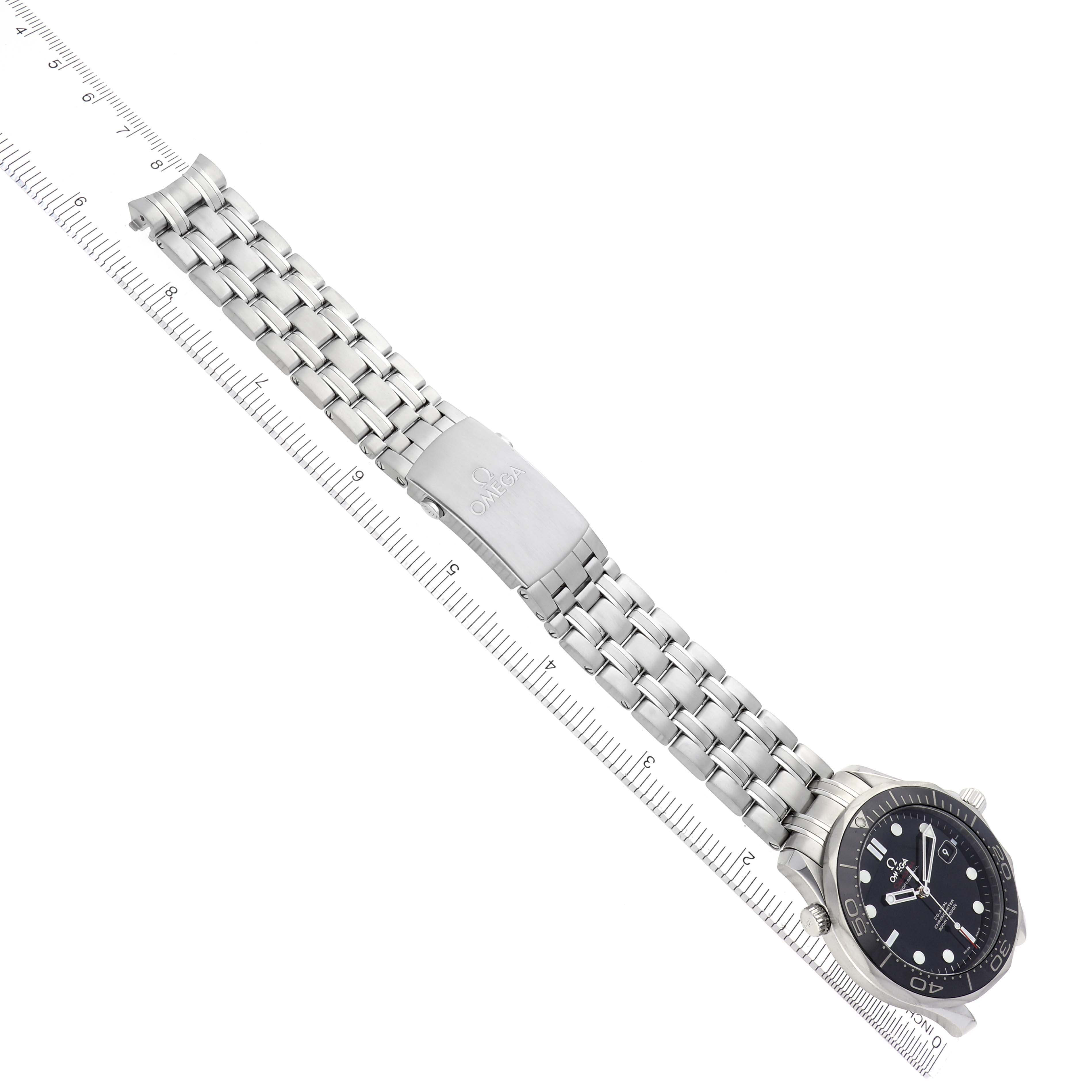 The image shows an Omega Seamaster 212.30.41.20.01.003 Men
s Stainless Steel Black Dial 212.30.41.20.01.003 Men
s Stainless Steel Black Dial watch laid flat with its stainless steel bracelet fully visible, positioned alongside a ruler.